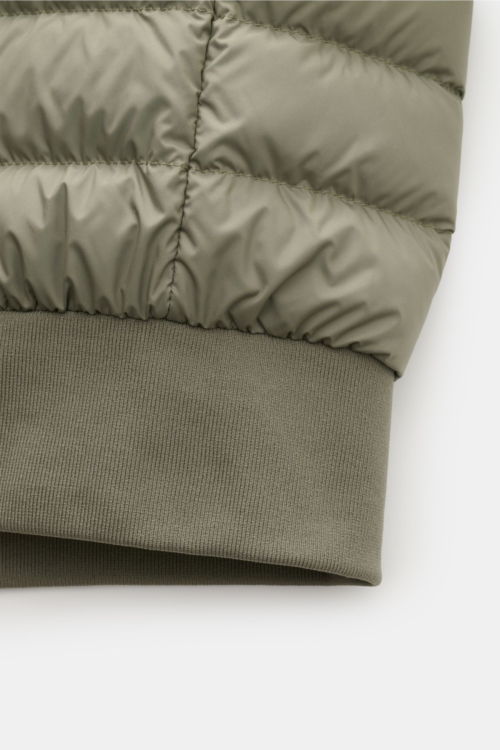 Close-up side view of the elastic hem of the sage Parajumpers Down blouson 'Breving' showing high-quality microfibre with smooth feel and stitching detail; style meets function with wind and water repellent fabric, warm down lining, regular fit, robust tw
