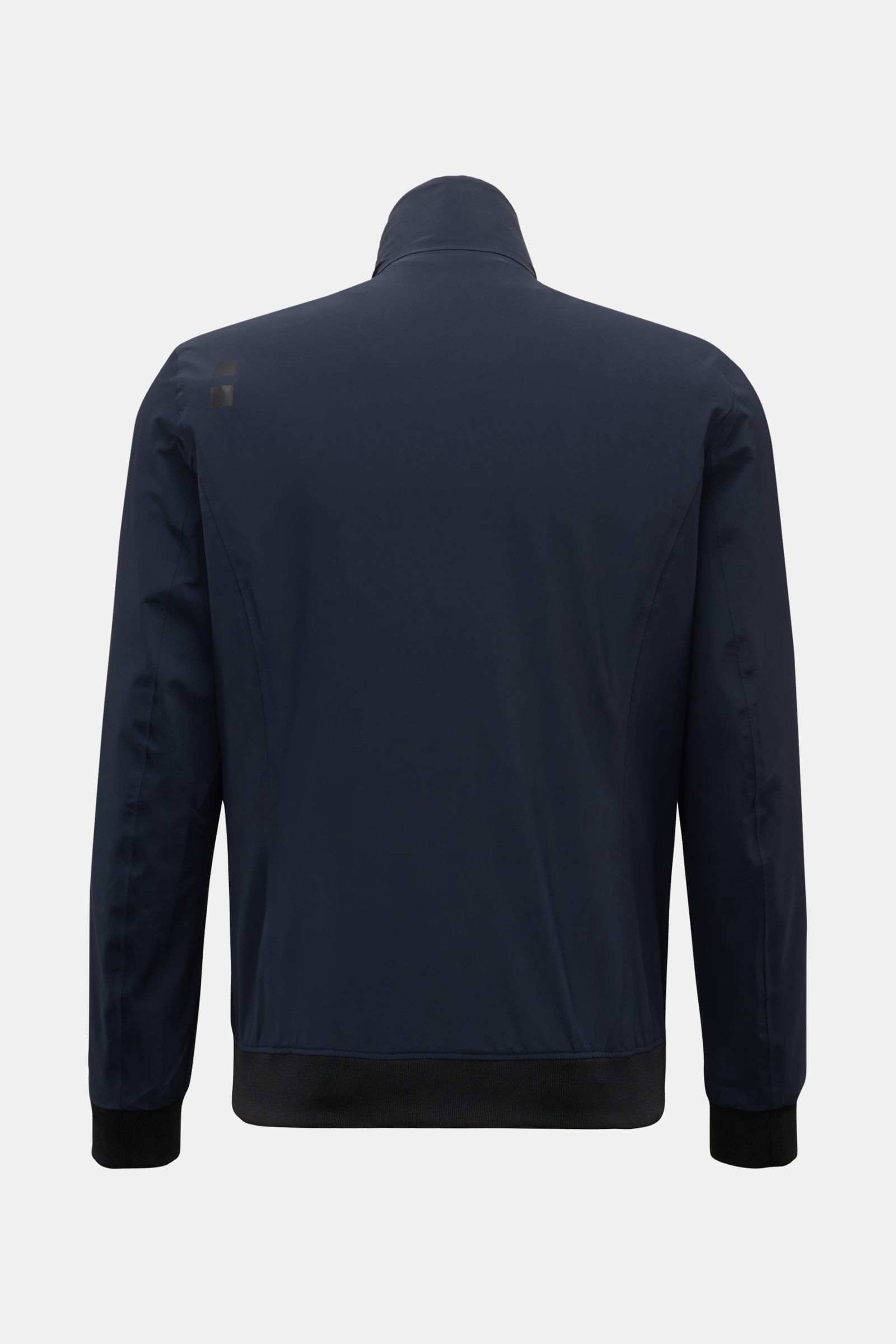 Rear view of UBR Blouson 'Delta' navy jacket with high collar, slim fit, elastic cuffs, and smooth microfiber fabric.

Note: The included HTML content is not typically part of an alt tag and cannot be integrated naturally within the 125-character limit fo