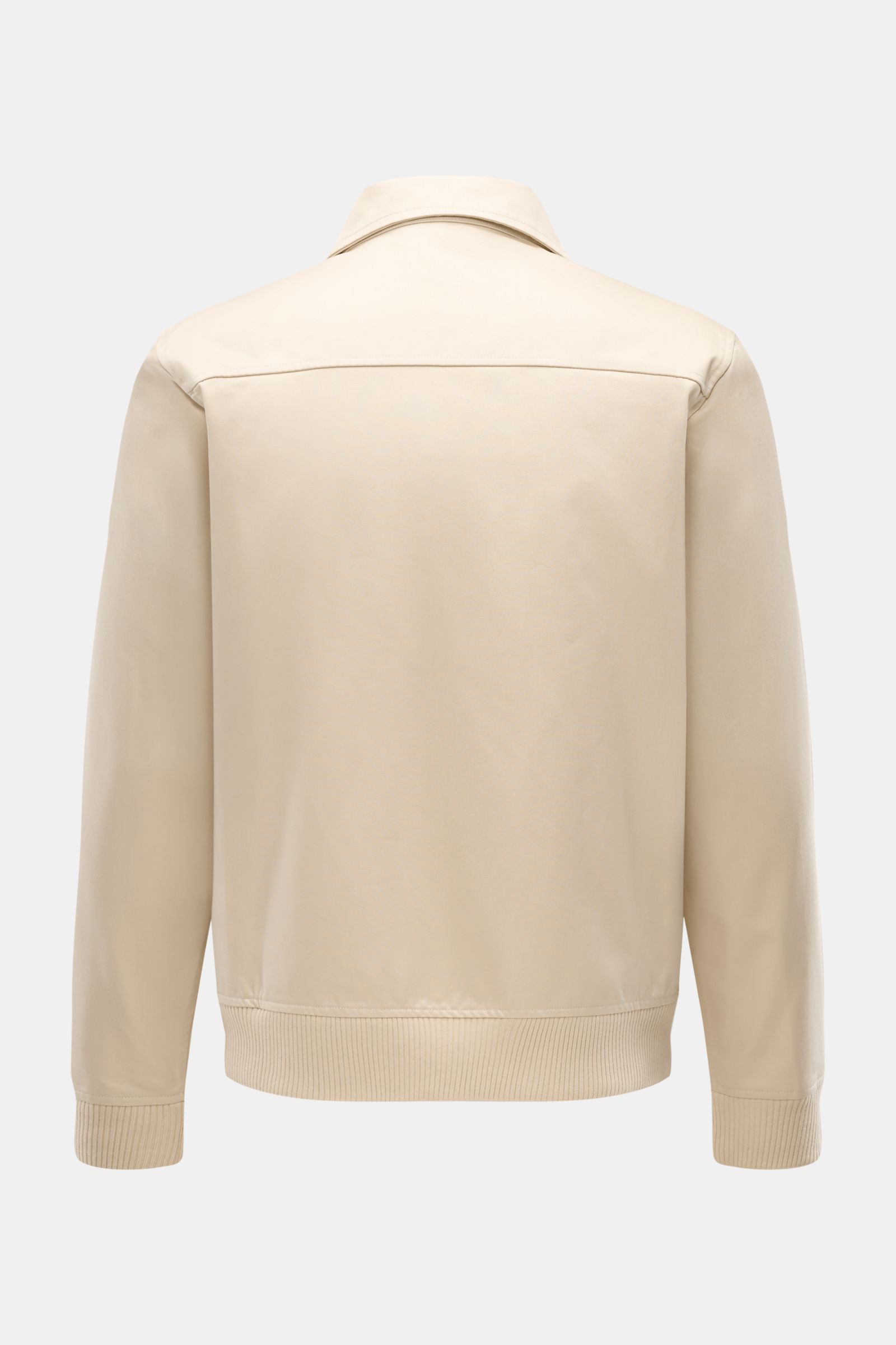 Rear view of 04651/ A trip in a bag Blouson 'Griffin' beige showing unconstructed design, pure cotton fabric, slim fit with elastic cuffs and waistband.