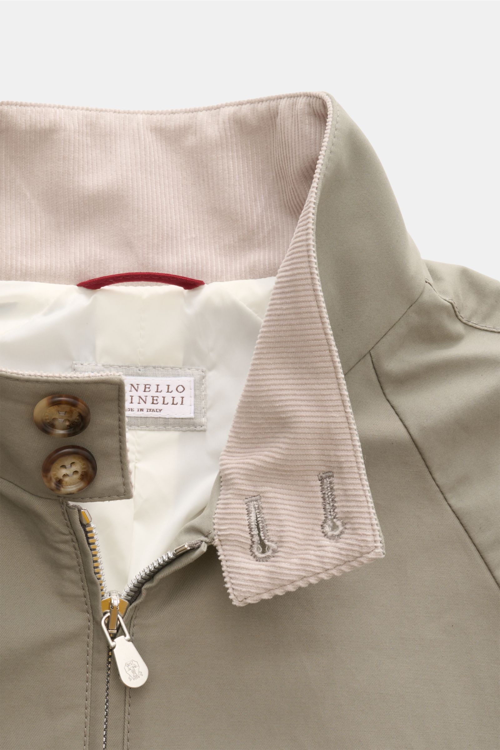 Close-up front view of Brunello Cucinelli Blouson salbei showing twill cotton and microfiber mix with corduroy collar, zipper, and buttons.