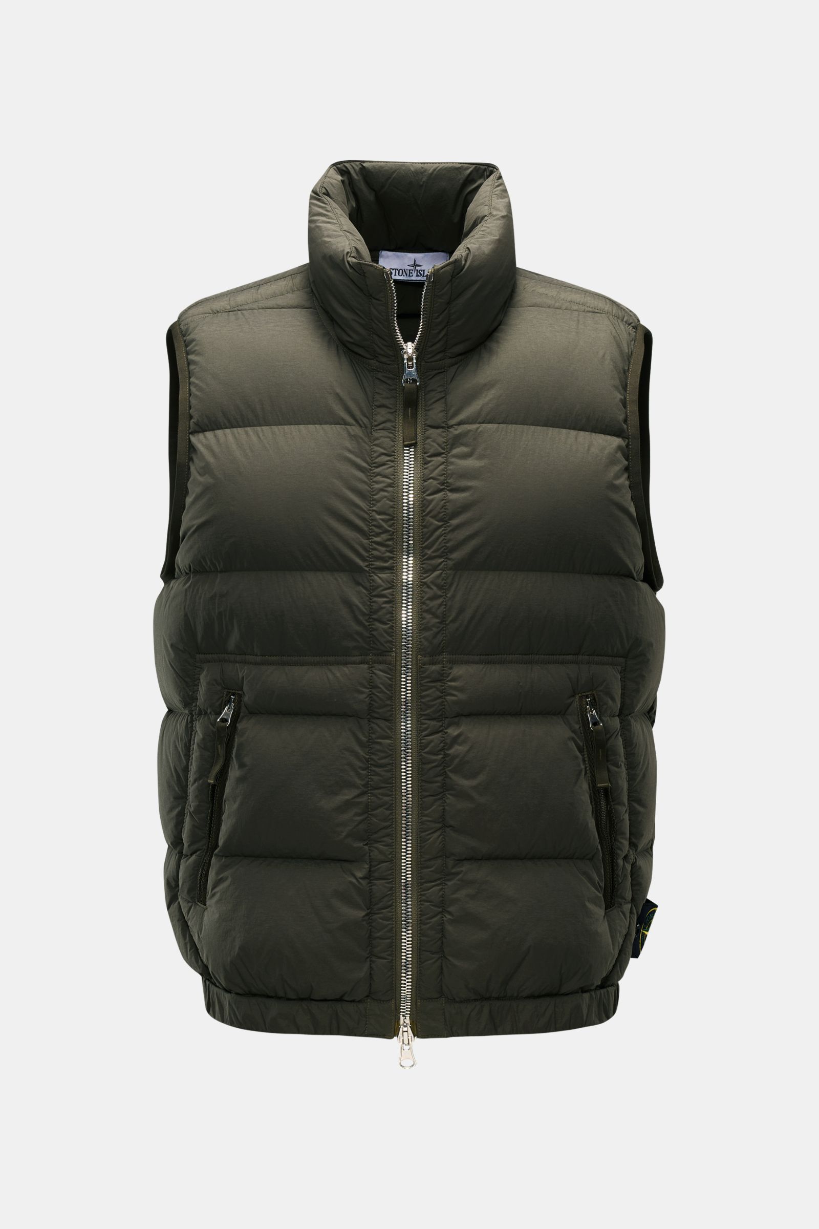 Front view of the Stone Island Down gilet 'Seamless Tunnel Nylon Down-TC' olive, featuring a standing collar, two-way zip, and zippered hip pockets.

Description: The outdoor gilet 'Seamless Tunnel Nylon Down-TC' by STONE ISLAND has a warm, responsibly
