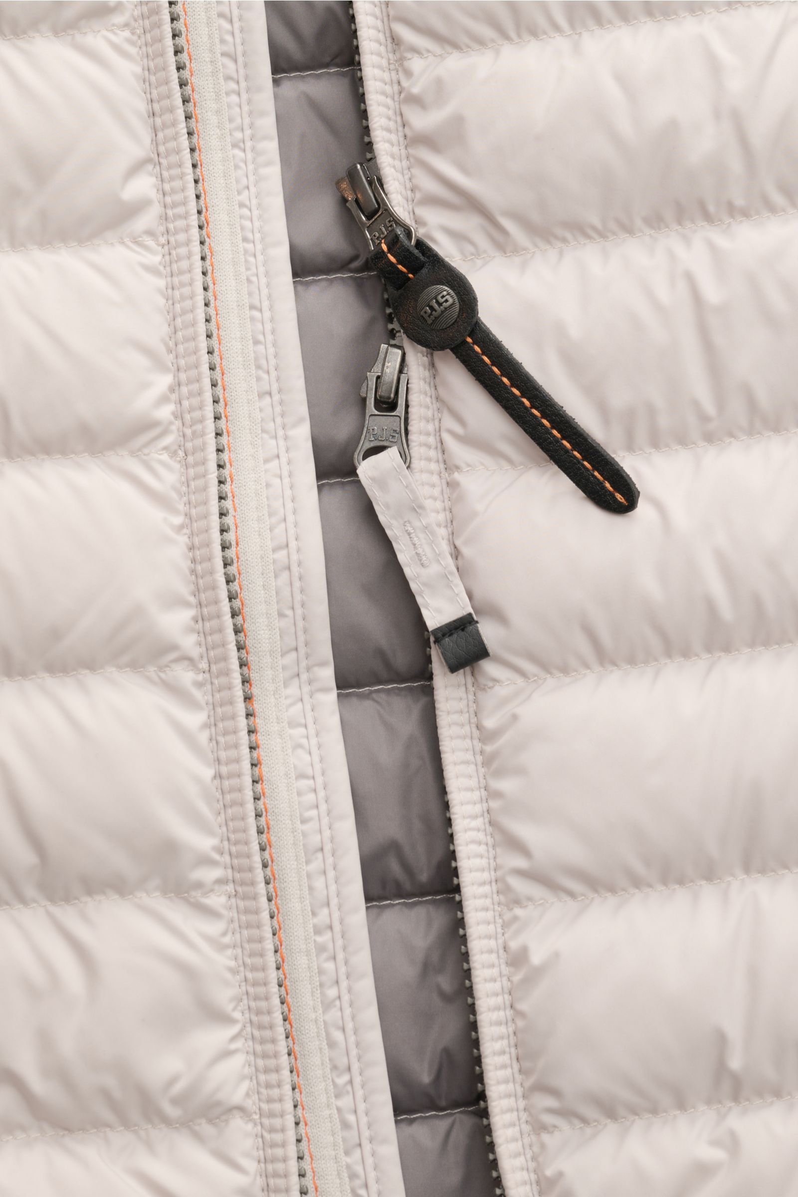 Close-up front view of the sand-colored Parajumpers Down gilet 'Perfect' showing dual zippers, quilted lightweight down lining, and microfiber fabric.

The incredibly lightweight and comfortable down gilet 'Perfect' by PARAJUMPERS features a classic de