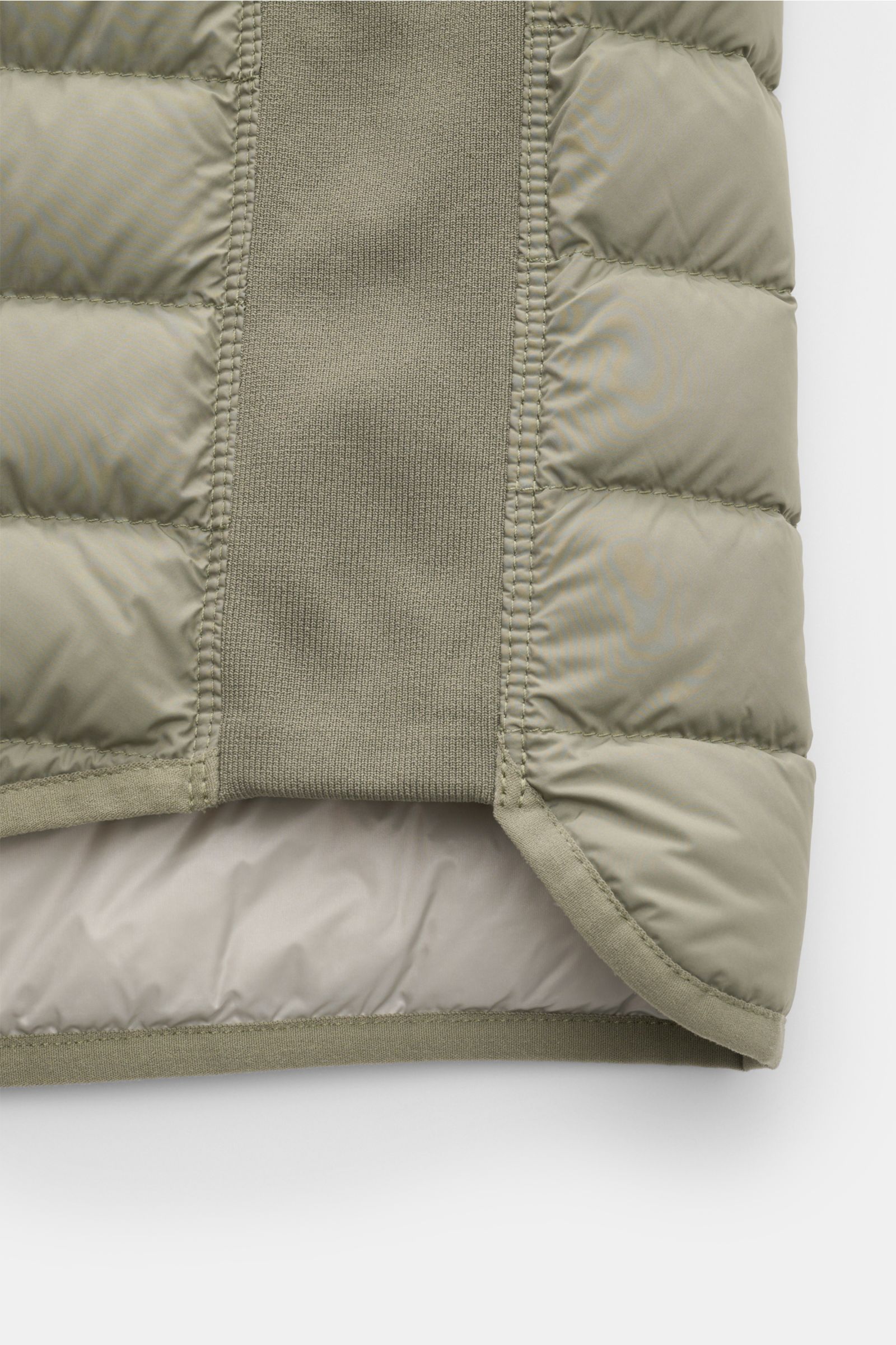 Close-up of the lower back of the Parajumpers Down gilet 'Perfect' sage, showing quilted microfiber and elasticated side insert from a rear perspective.

The incredibly lightweight and comfortable down gilet 'Perfect' by PARAJUMPERS features a classic 