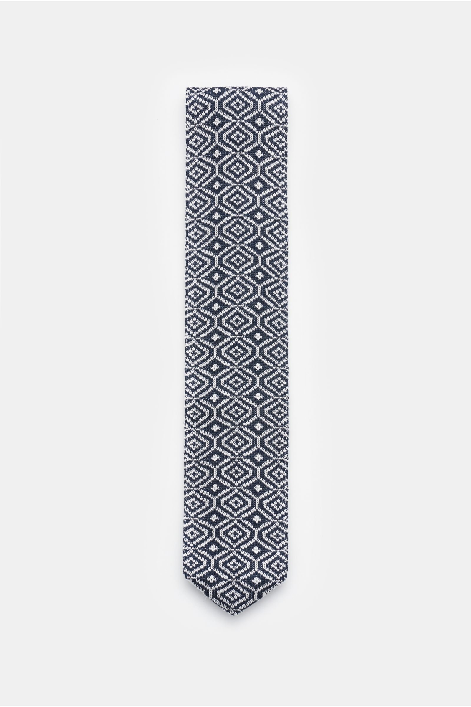 Silk knitted tie in navy/white patterned