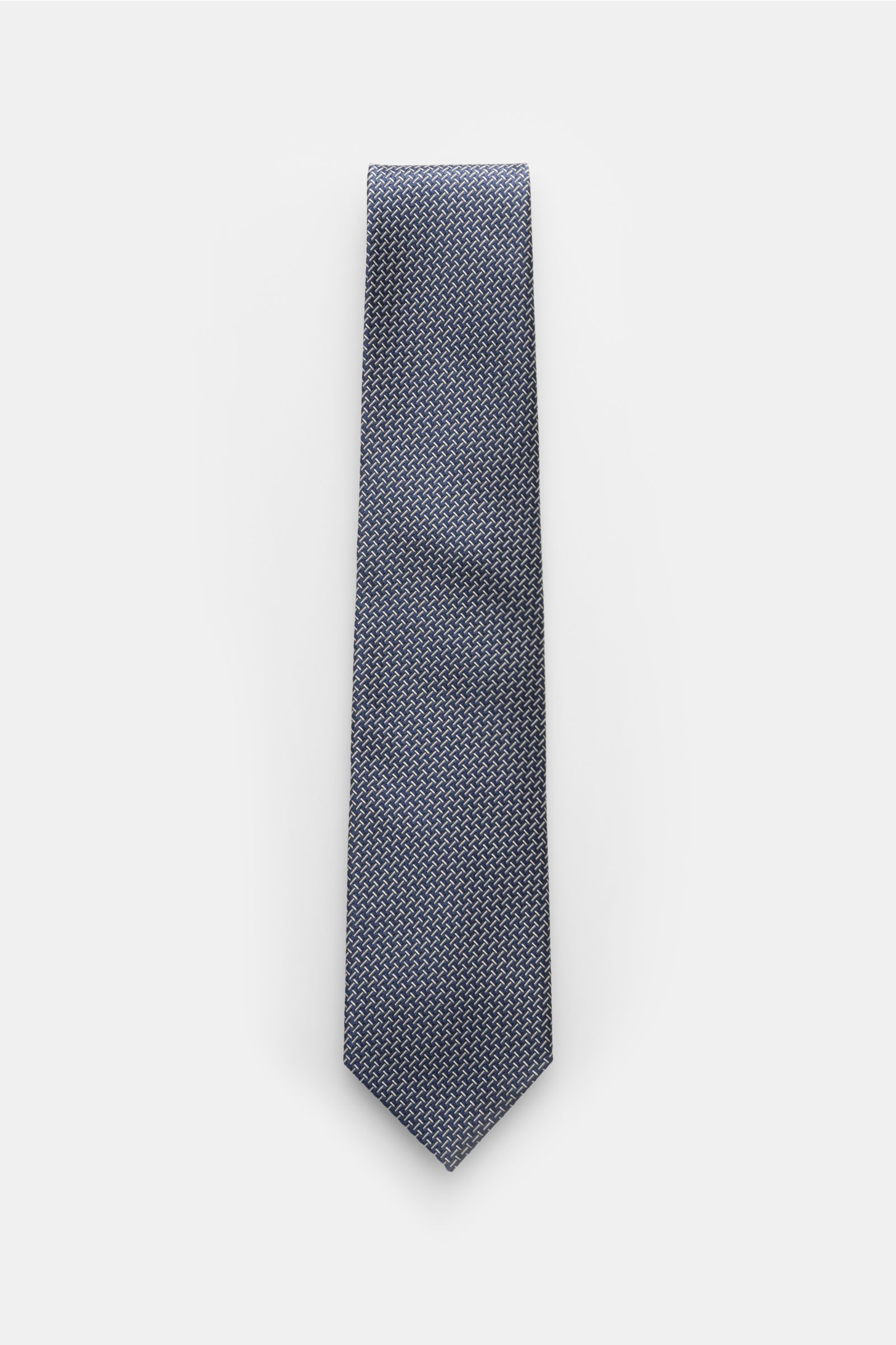 Tom Ford Seidenkrawatte navy/creme gemustert, frontale Draufsicht, reine Seide, dezenter Glanz, grafisches Muster, Logo-Stitching, made in Italy, 8 cm breit.