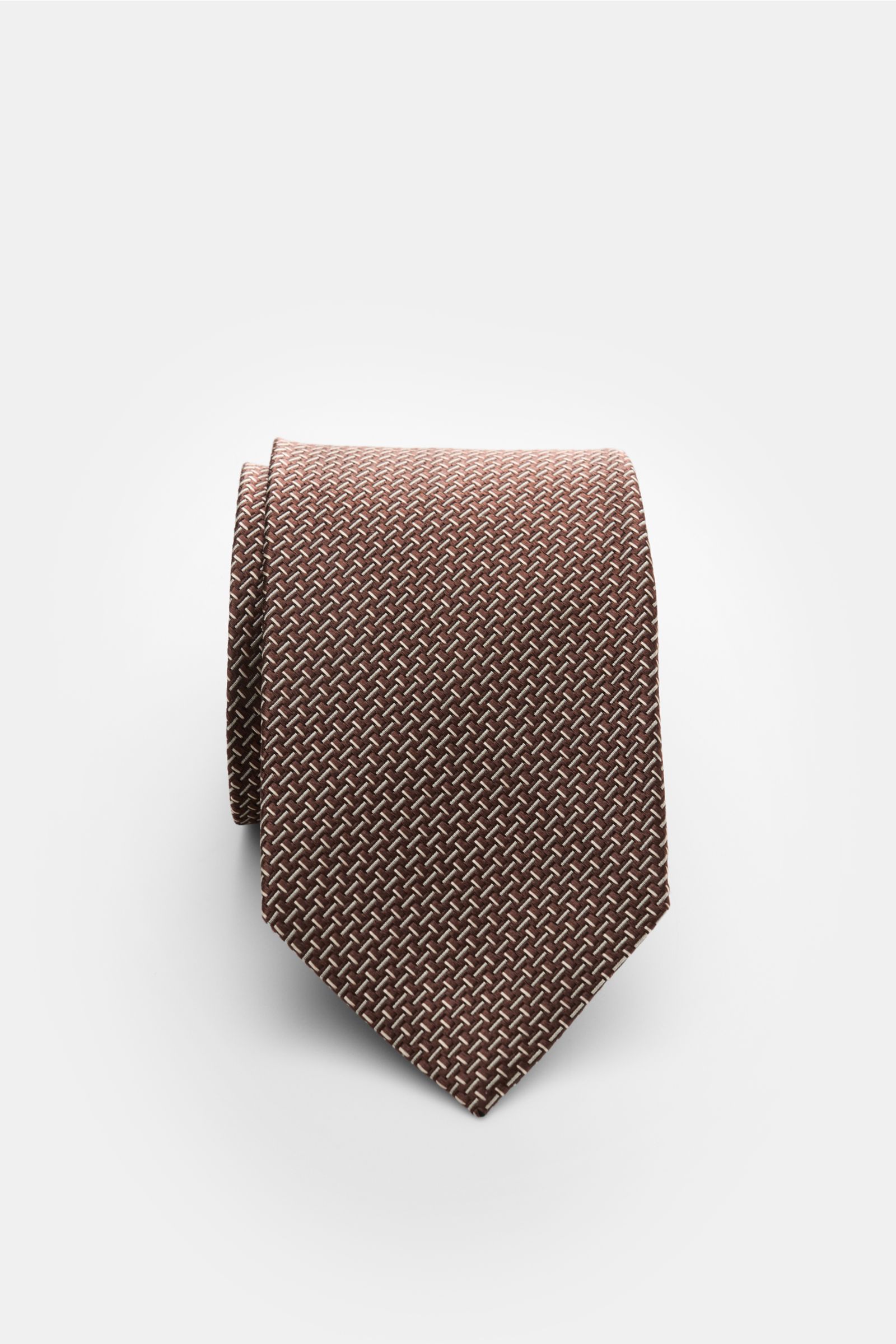 Tom Ford Seidenkrawatte braun/creme gemustert, nah, grafisches Muster, dezenter Glanz, reine Seide, Logo-Stitching, made in Italy, 8 cm breit.