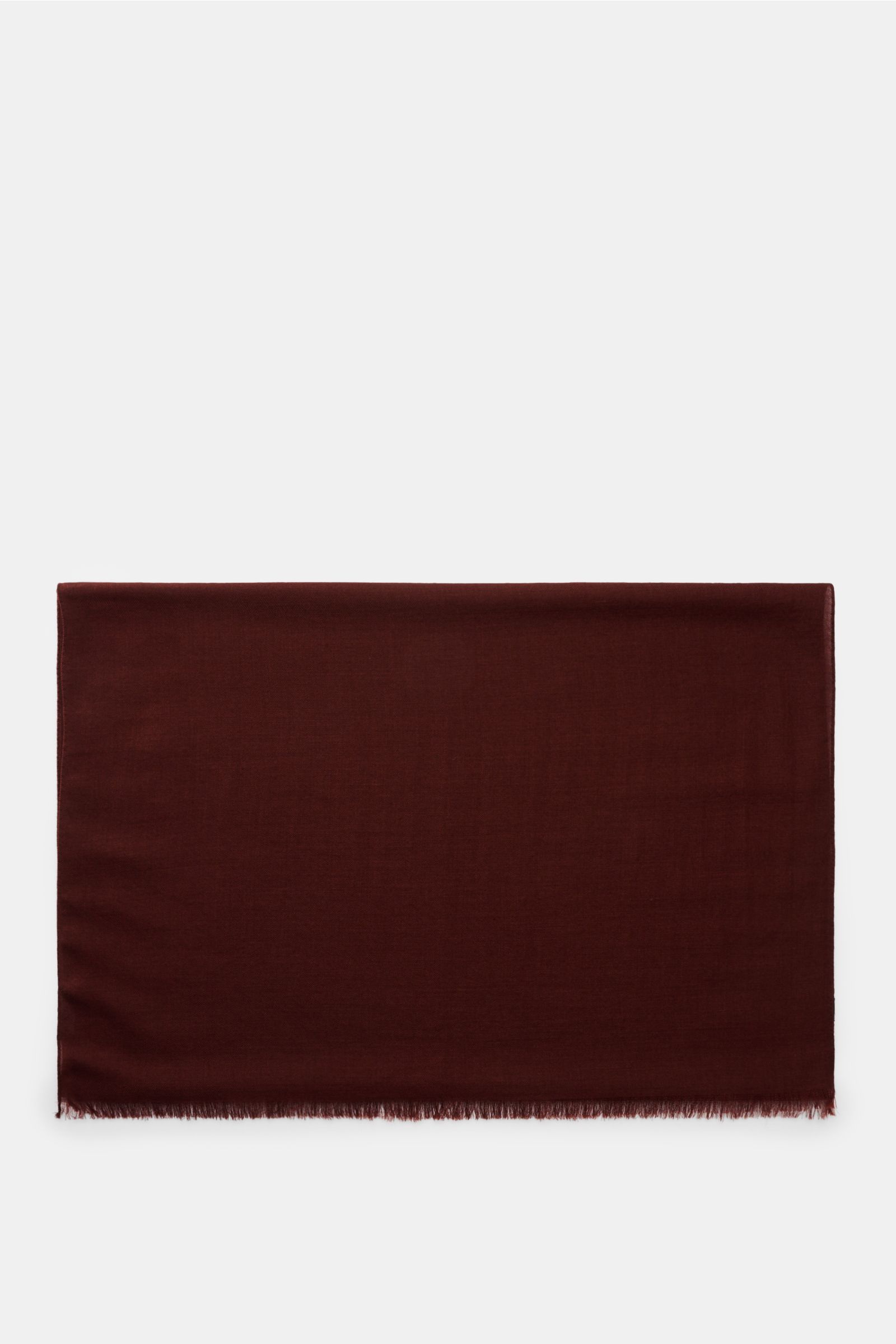 Colombo Schal rotbraun shown from above, folded flat, with a mix of fine cashmere and silk, soft touch, very light quality, rolled edges, narrow fringe edge, size approx. 196 cm x 70 cm.