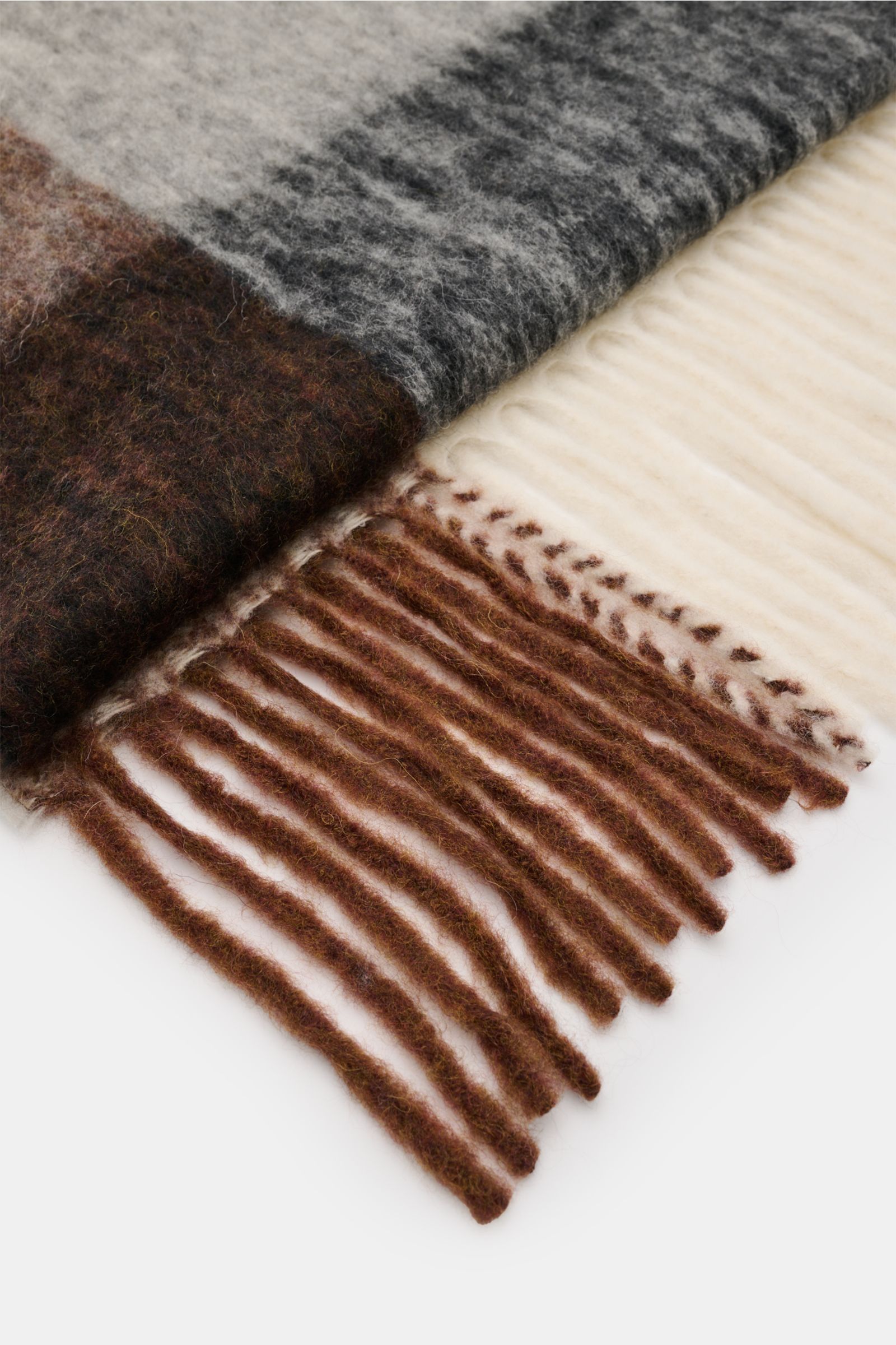 Close-up, top-down view of the 04651/ A trip in a bag Schal 'Color Block Scarf' grau/braun/creme showing soft alpaca, wool, polyamide blend with fringed edges and color block design.