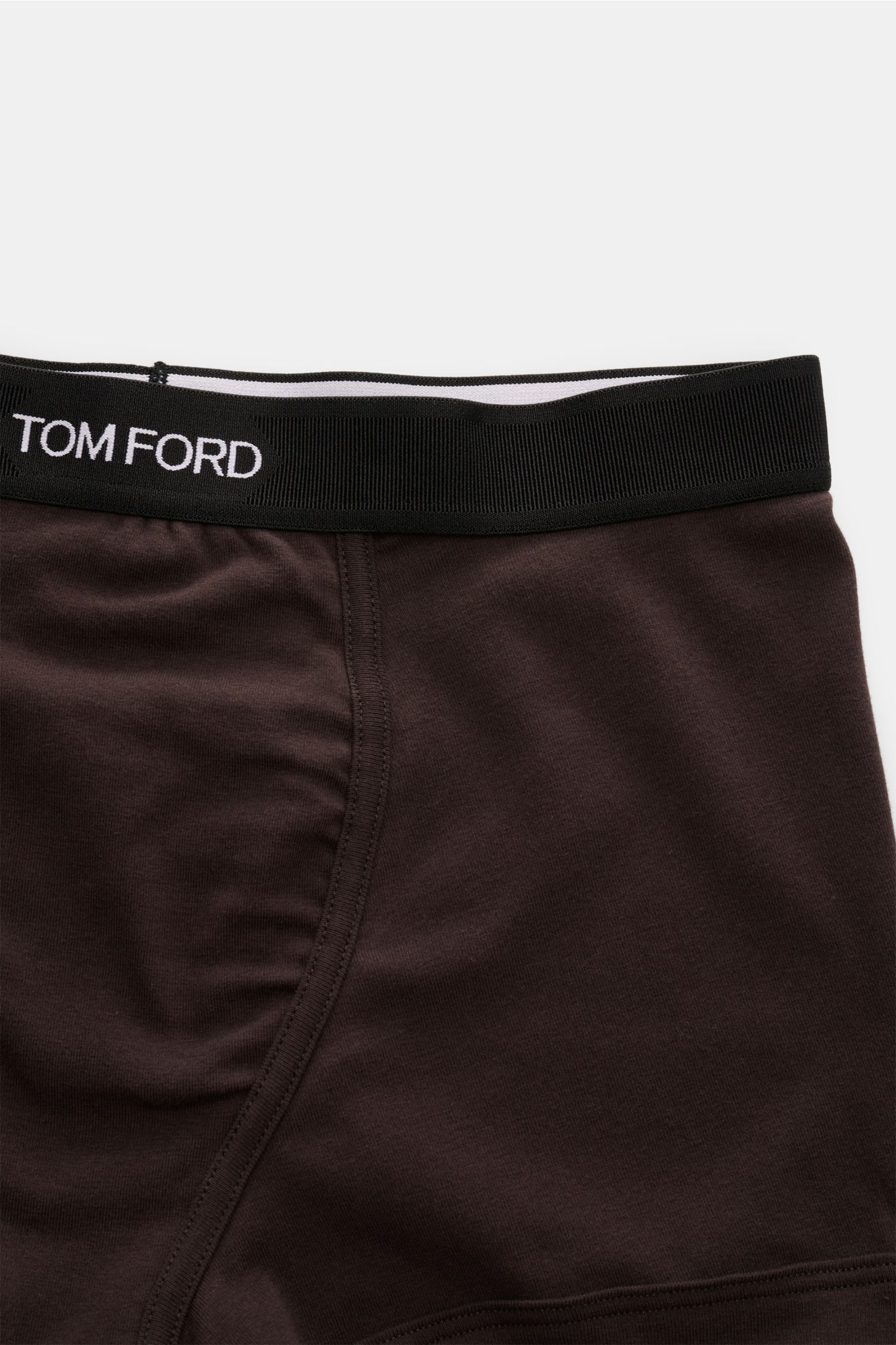 Tom Ford Boxershorts dunkelbraun in Slim Fit, sportlich, schlicht, luxuriös, mit elastischem Bund und seitlichem Eingriff, Detailaufnahme von oben.