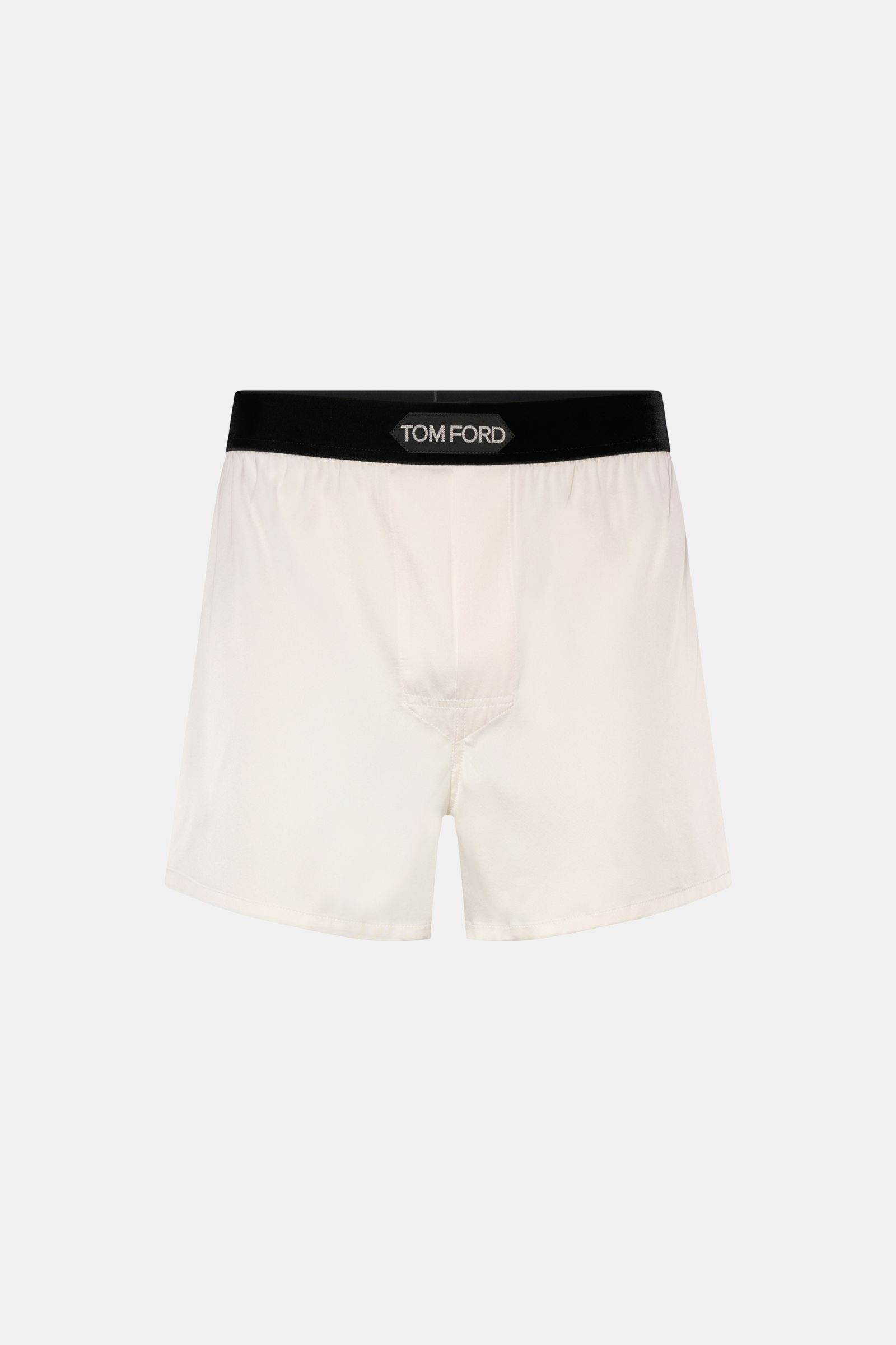 Front view of Tom Ford Seiden-Boxershorts offwhite with black elastic velvet waistband and logo, made of silk with elastane for comfort.