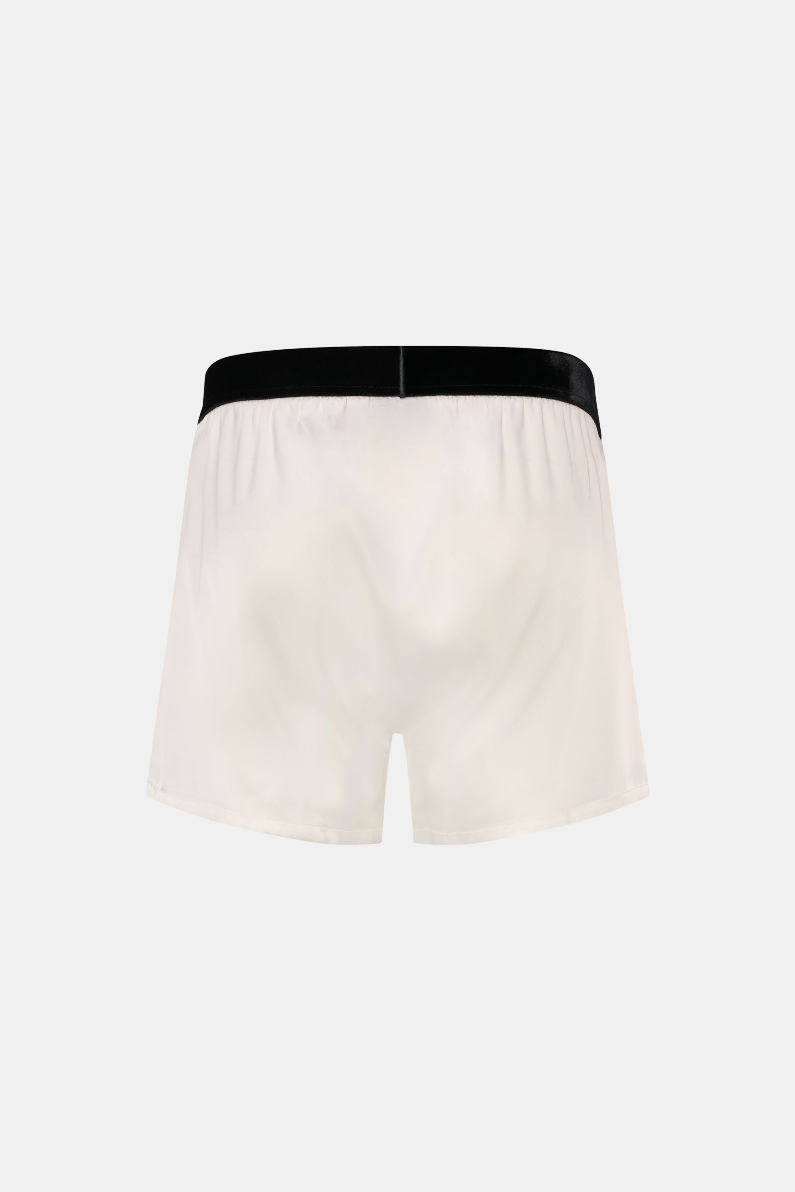 Rear view of Tom Ford Seiden-Boxershorts offwhite in slim fit, featuring luxurious silk with elastane, soft velvet waistband with logo, and side fly.

Description: Luxus, der auf der Haut beginnt: Diese Boxershorts von TOM FORD vereinen edle Seide mit ein