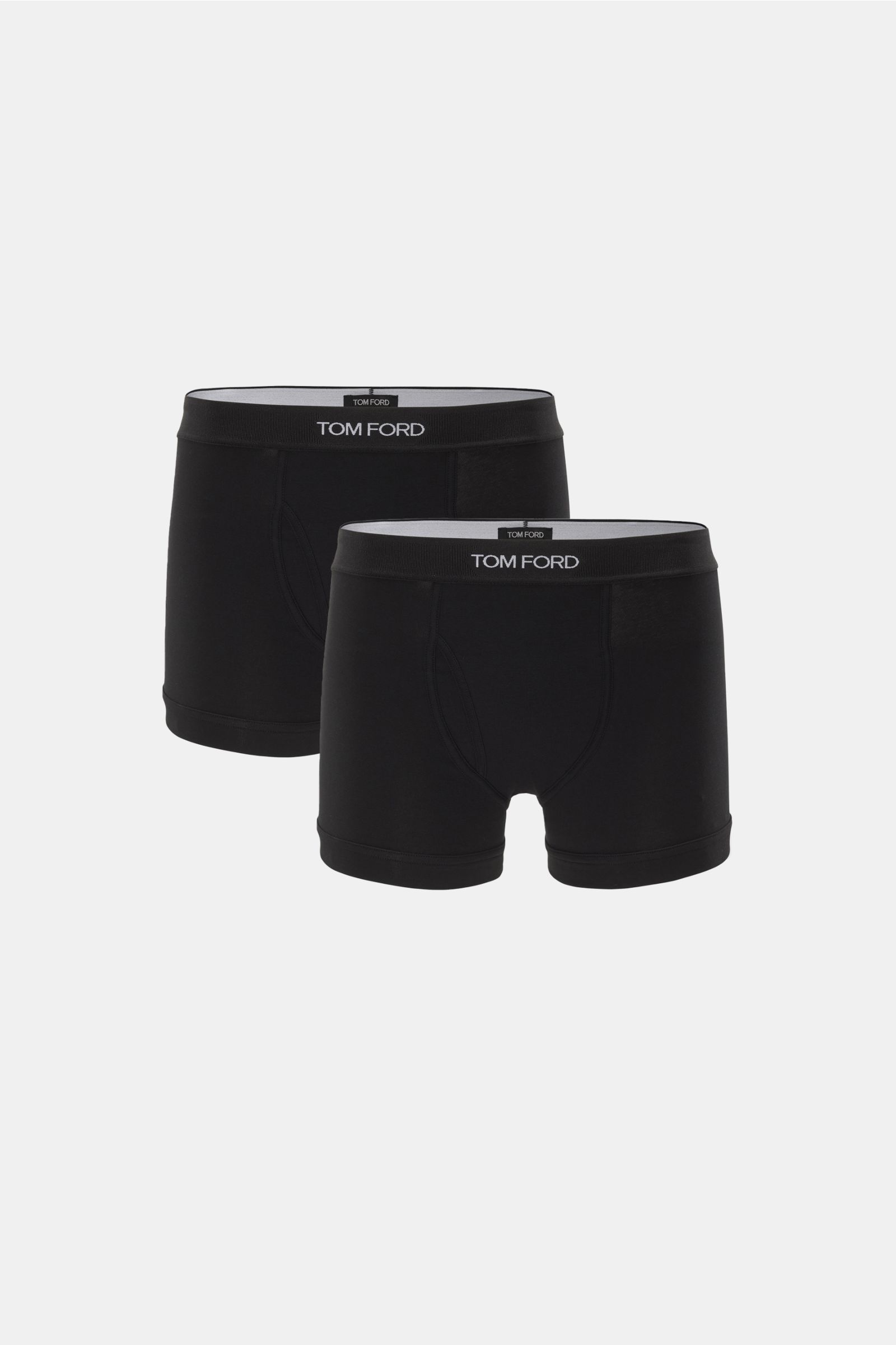 Front view of Tom Ford Boxershorts 2er-Set schwarz in black, featuring elastic waistband with TOM FORD stitching and side fly.

Sportlich, schlicht und luxuriös: Die komfortablen Boxershorts mit praktischem Eingriff und TOM FORD-Stitching auf dem elast