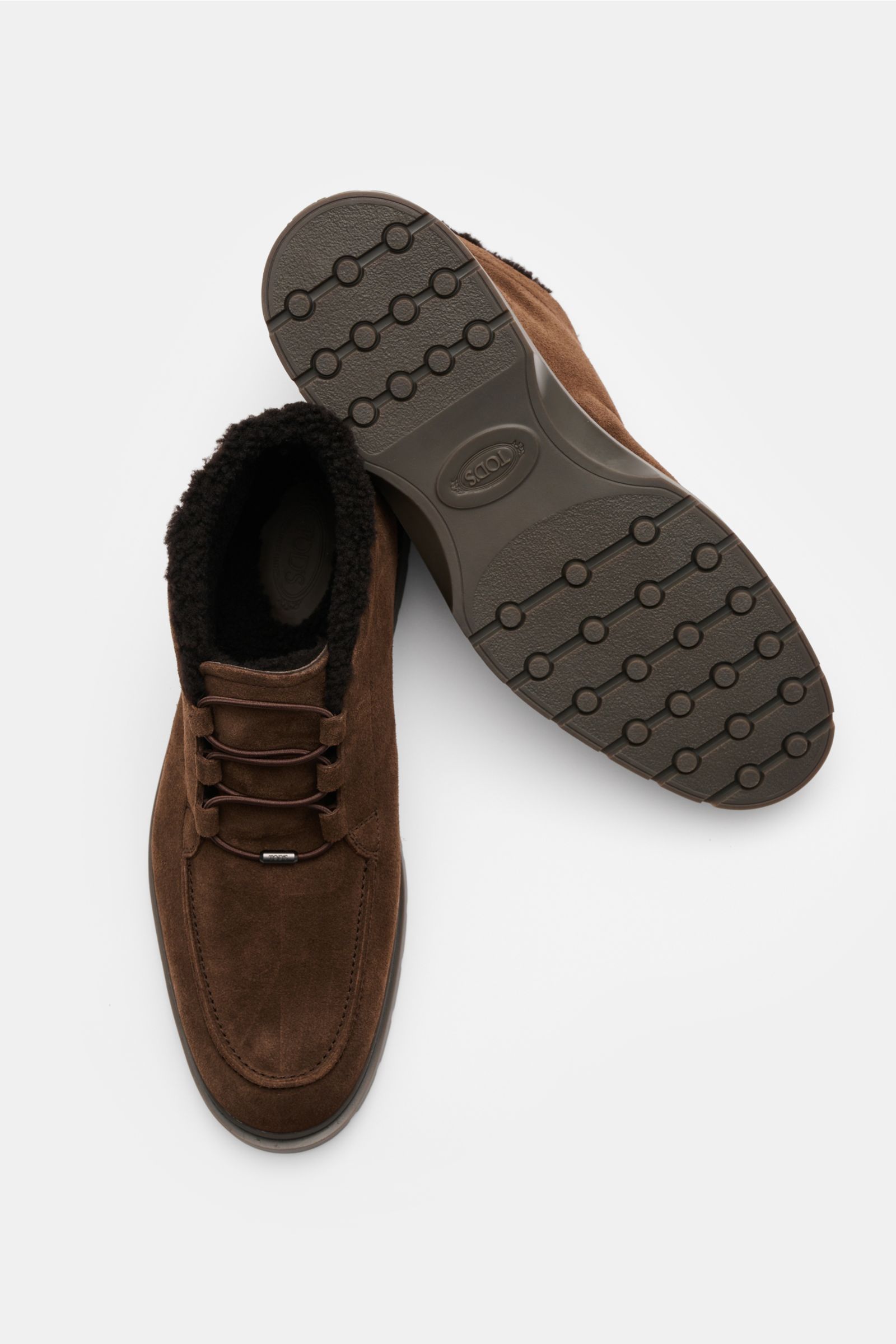 Tod's Boot dunkelbraun aus edlem Veloursleder mit Lammfell-Futter, elastischer Schnürung, Steppnaht und genoppter Gummisohle, Draufsicht.