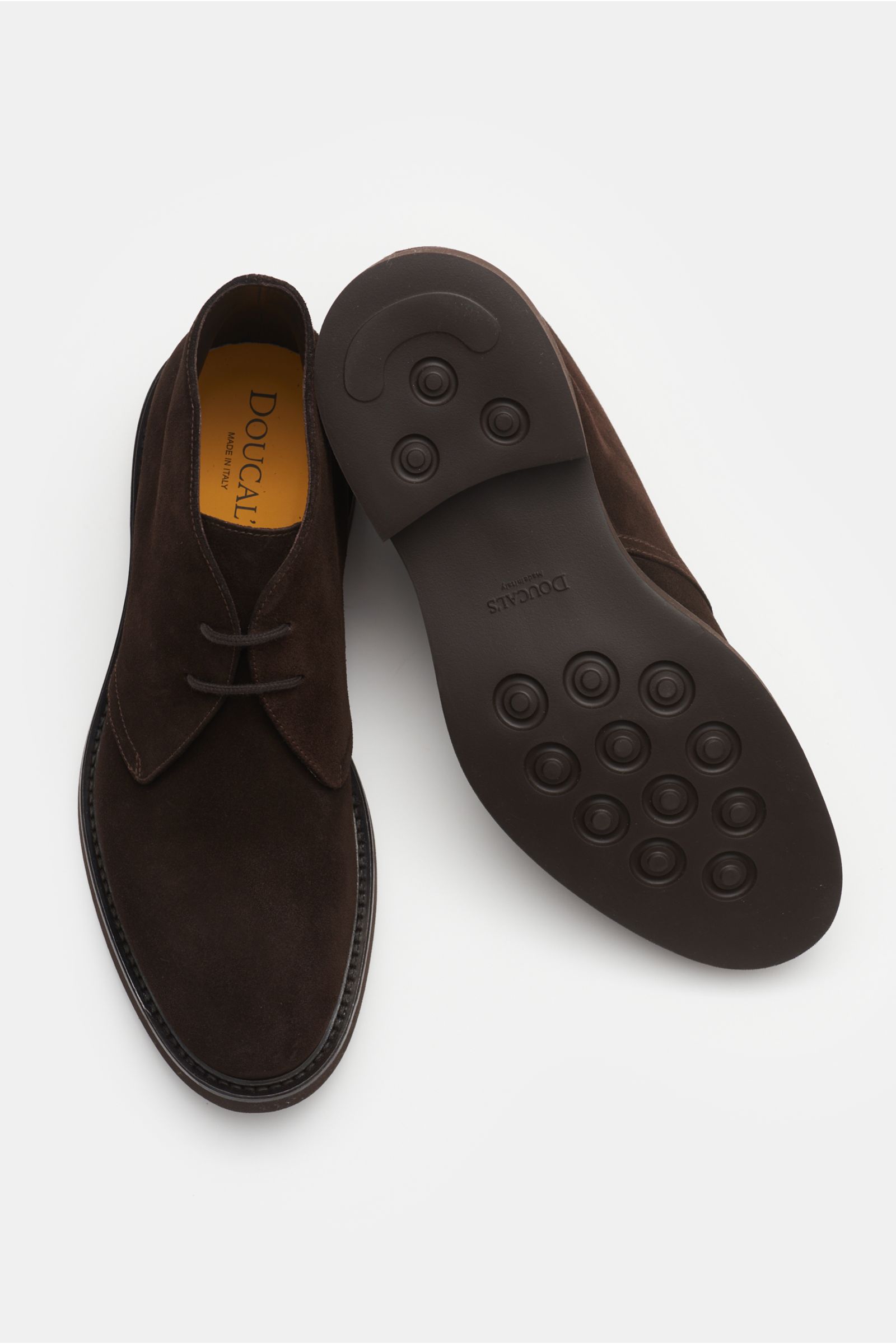 Doucal's Desert boots dark brown shown from above, featuring fine suede, tapered silhouette, two-eyelet lacing, leather lining, and rubber outsole.