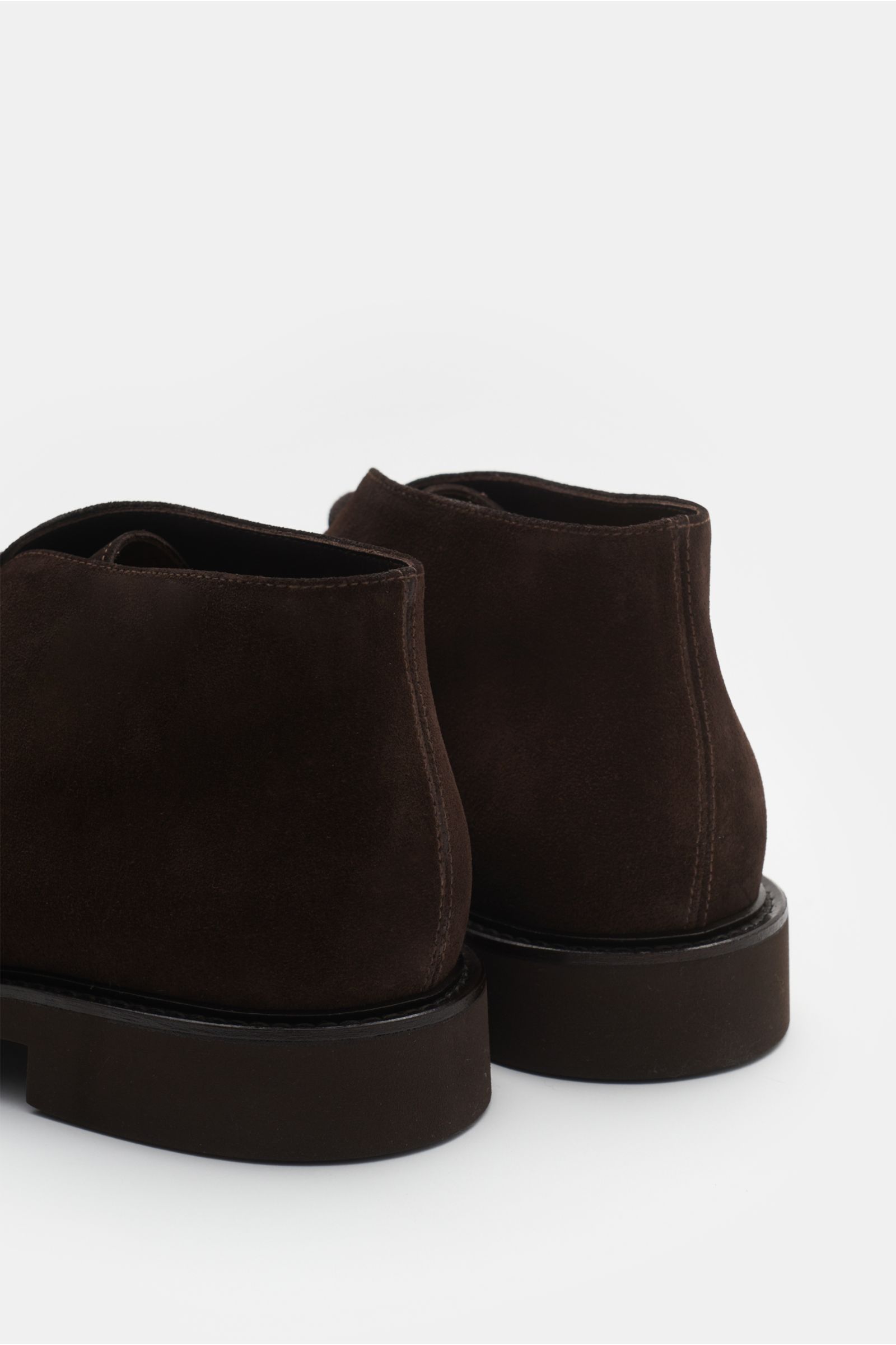 Rear view of Doucal's Desert boots dark brown made of fine suede with tapered silhouette, two-eyelet lacing, leather lining, rubber outsole.