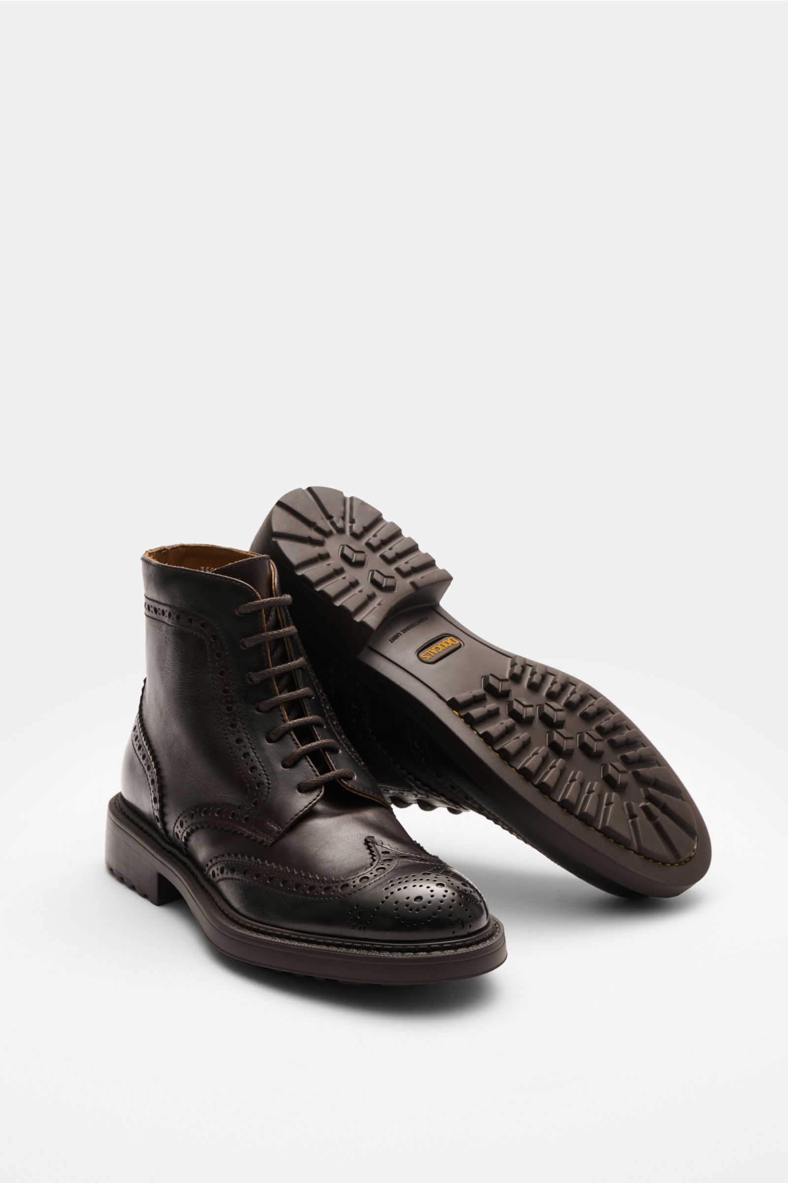 Doucal's Schnürboot dunkelbraun aus genarbtem Leder mit Brogueings, sieben-Loch-Schnürung, Profilsohle, seitliche und Unteransicht.