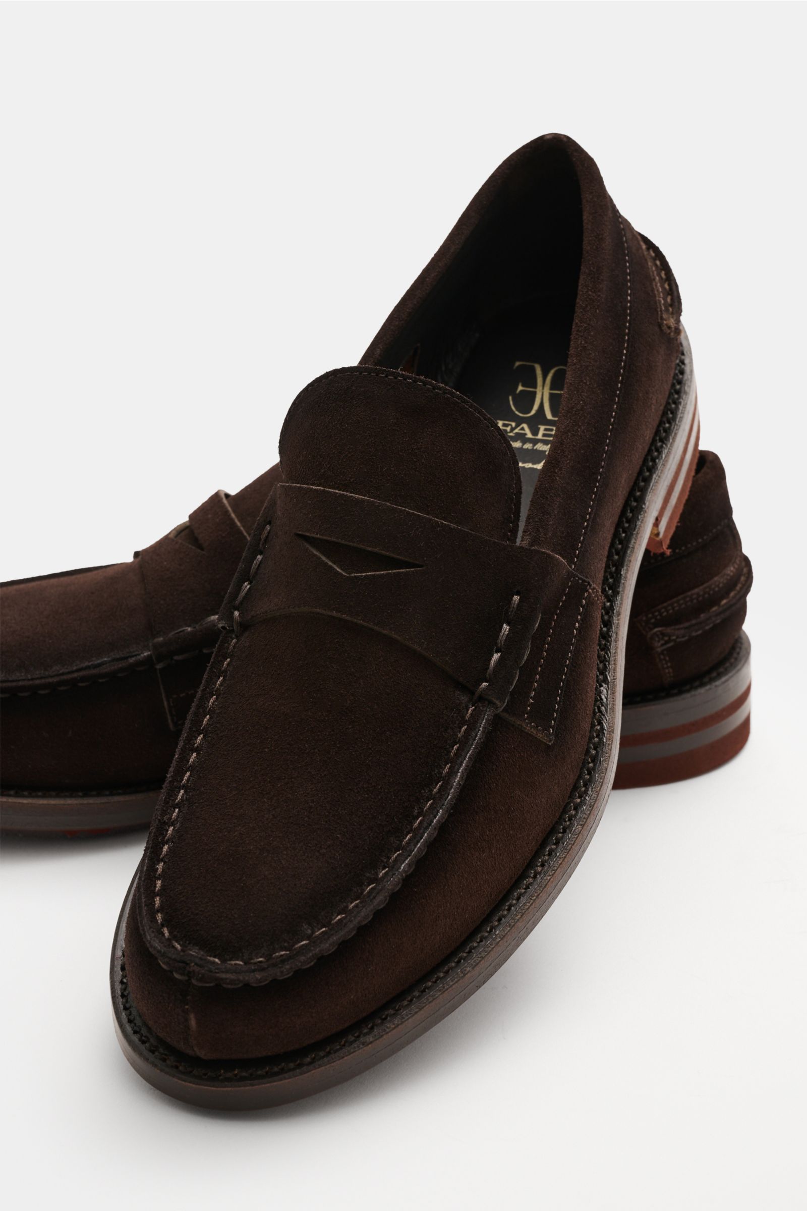 Front angled view of Fabi Penny Loafer 'Preppy Sensory Peach Corvino' dunkelbraun in fine dark brown velour with Penny strap, decorative stitching, and layered rubber sole.