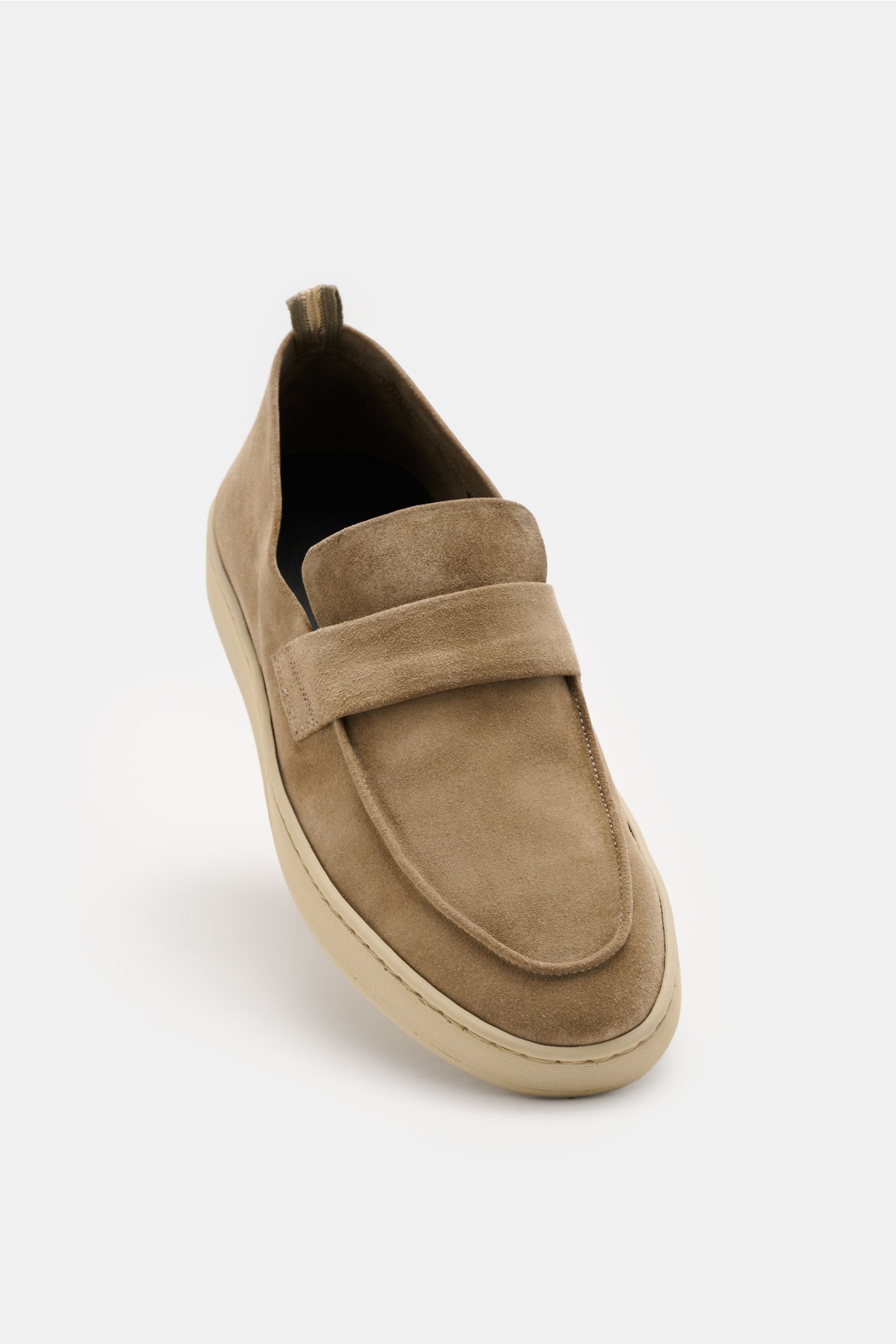 Officine Creative Loafer 'Herbie' beige shown from a front angle, made of smooth beige velour leather with a soft touch, slightly narrow shape, typical strap, practical pull tab, and flexible natural rubber sole for unmatched comfort. Stilvoll Schritt hal