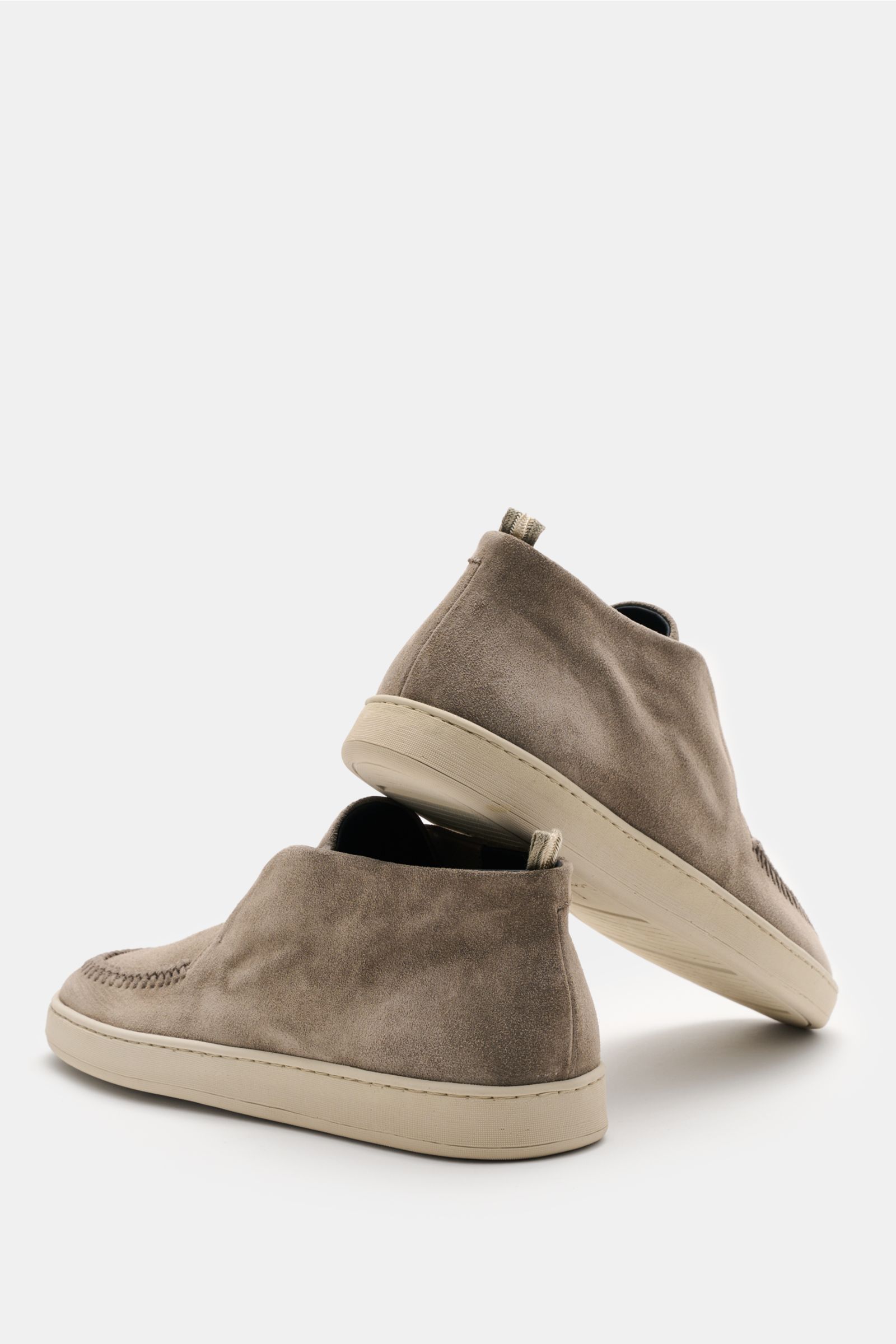 Rear and side view of Officine Creative Loafer 'Herbie' taupe in smooth suede with slim silhouette, decorative stitch, Grosgrain loop, leather lining, and flexible rubber sole for secure comfort and style.