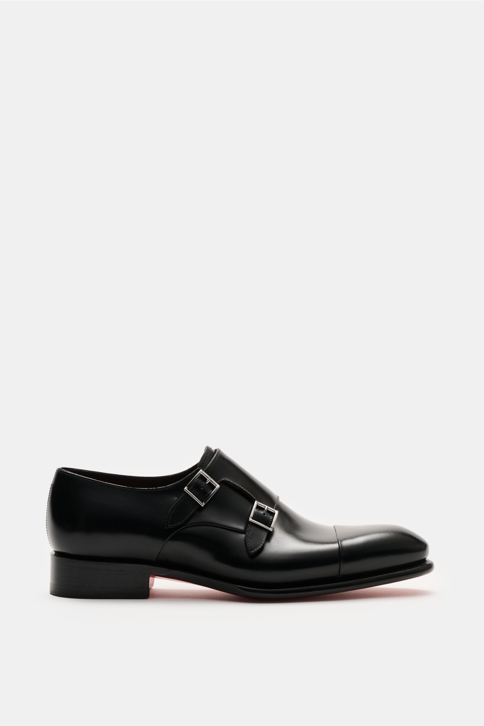 Santoni Doppelmonk schwarz shown from the side in black calf leather with rounded toe, double silver buckles, leather lining, and rubber-reinforced heel.