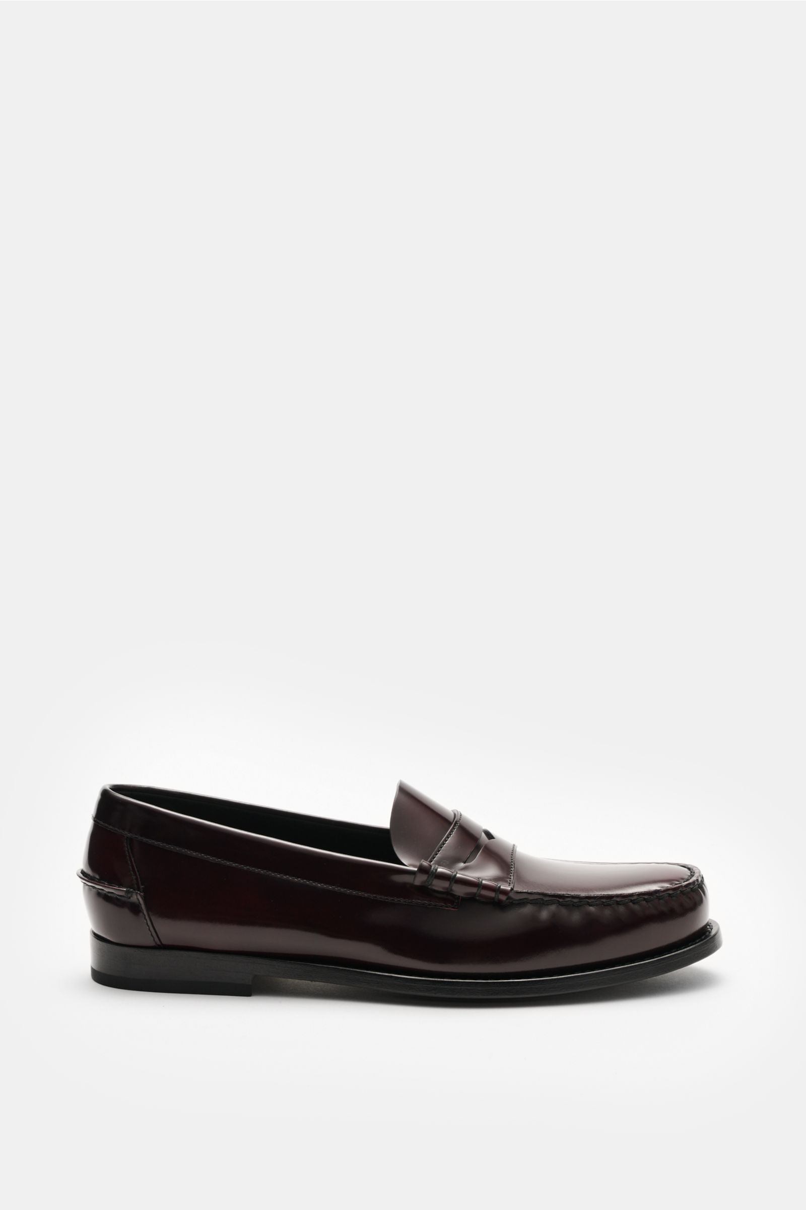 Church's Penny Loafer 'Rowley' bordeaux shown from the side, polished smooth leather with penny strap, decorative stitching, leather lining, Goodyear welted, slim silhouette, leather sole, rubber-reinforced heel, perfect for stylish British looks.