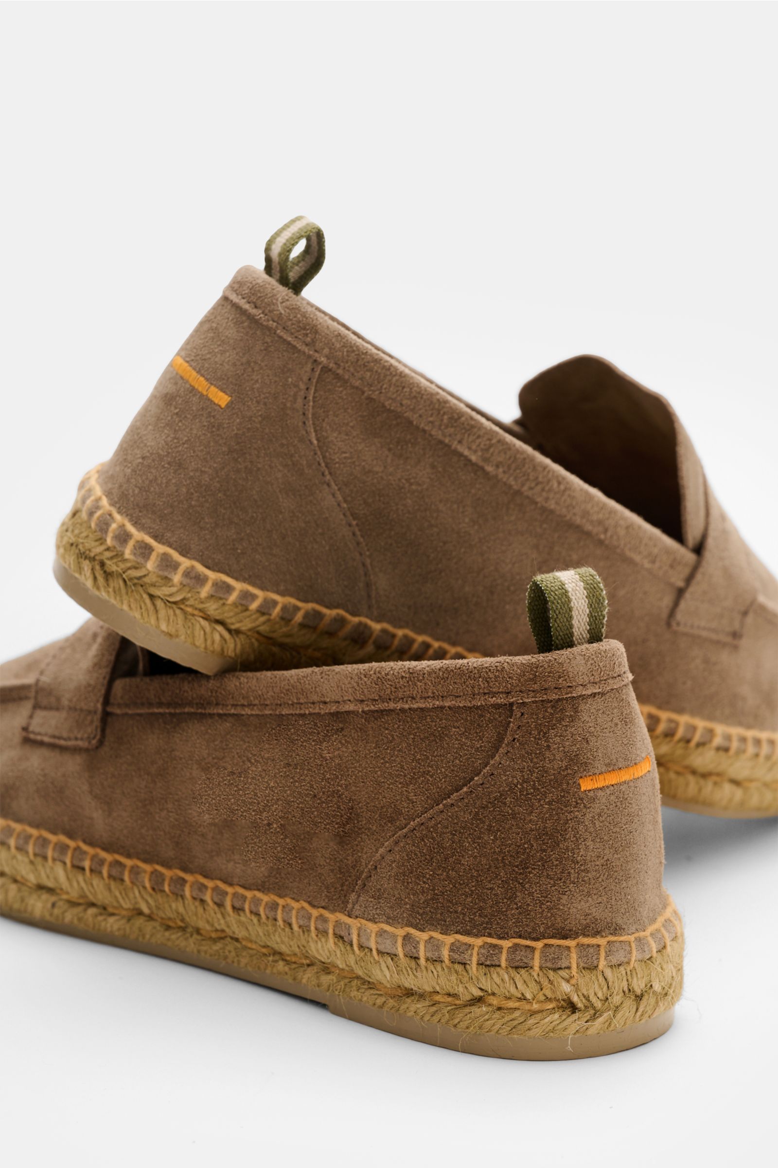 Rear-side view of Castañer Espadrilles 'Nacho T' taupe in soft velour leather with jute edging, penny strap, decorative stitching, and flexible rubber sole.