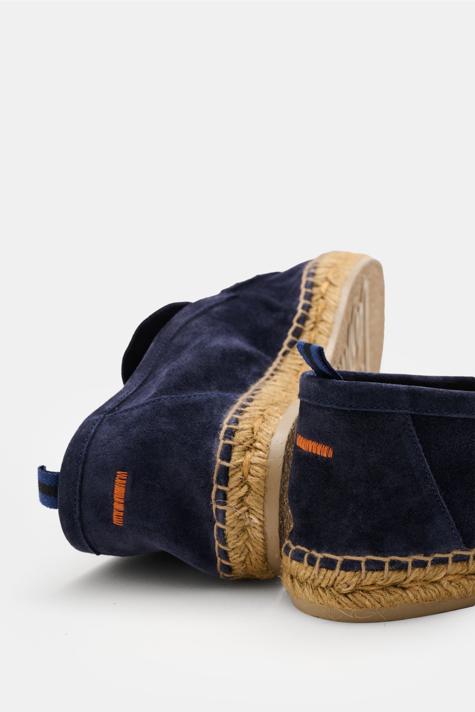 Rear and side view of Castañer Espadrilles 'Nino T' navy in soft velour leather with jute trim, decorative front seam, pull loop, and flexible rubber sole.