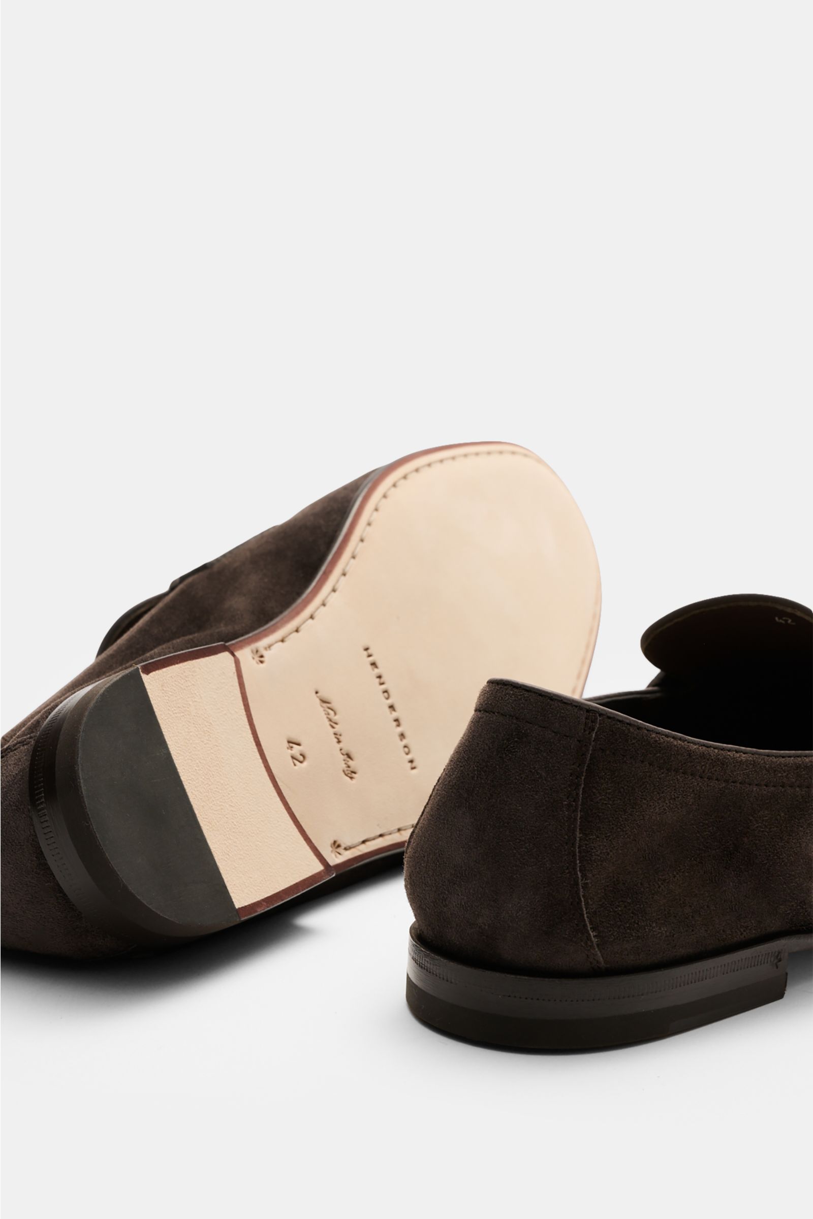 Rear and sole view of Henderson Penny Loafer 'T. Moro' dunkelbraun in smooth dark brown velour leather with Goodyear welted sole, leather lining, and rubber-reinforced heel.