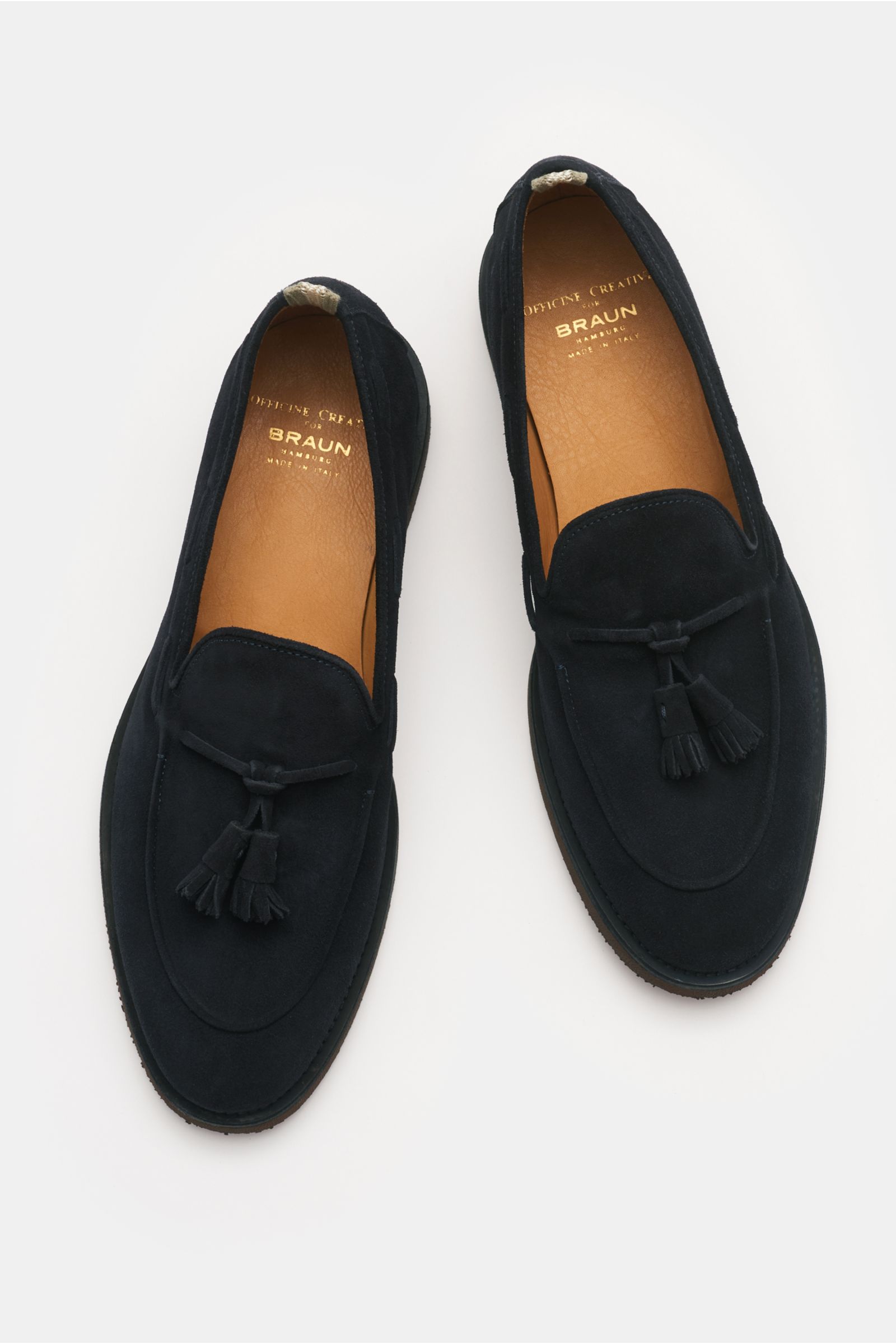 Top-down view of Officine Creative Tassel Loafer 'Opera Flexi 106' navy in soft velour leather with tassel detail, smooth processing, slim silhouette, Goodyear welt, grosgrain pull loop, leather lining, and natural rubber sole for comfort. Stilvoll Schrit