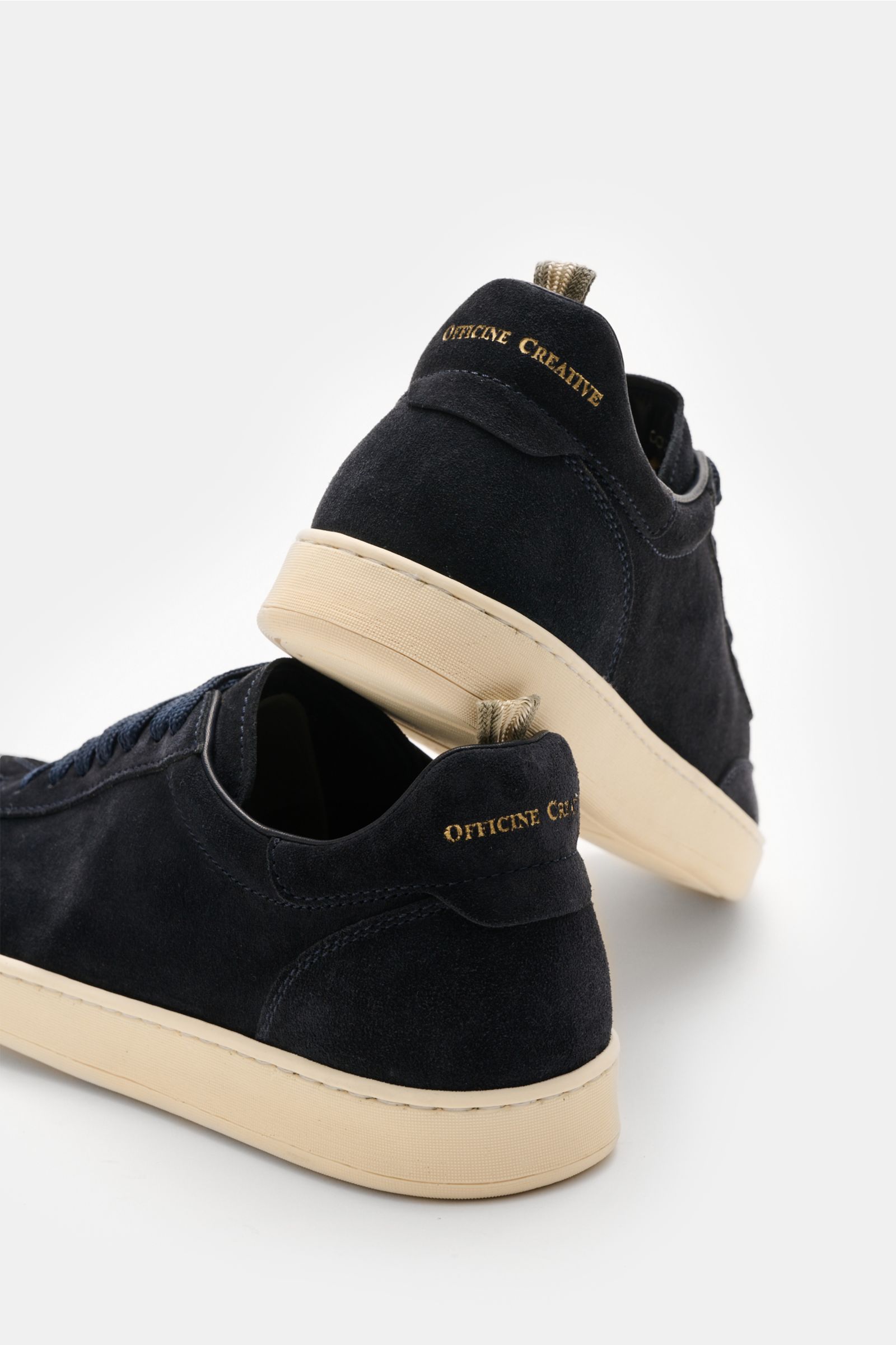 Rear and side view of Officine Creative Sneakers 'Kafka' navy in premium suede with signature grosgrain loop and lightweight sole.

Description: For anyone who appreciates comfort: The sneakers 'Kafka' in suede by OFFICINE CREATIVE with extra lightweight 