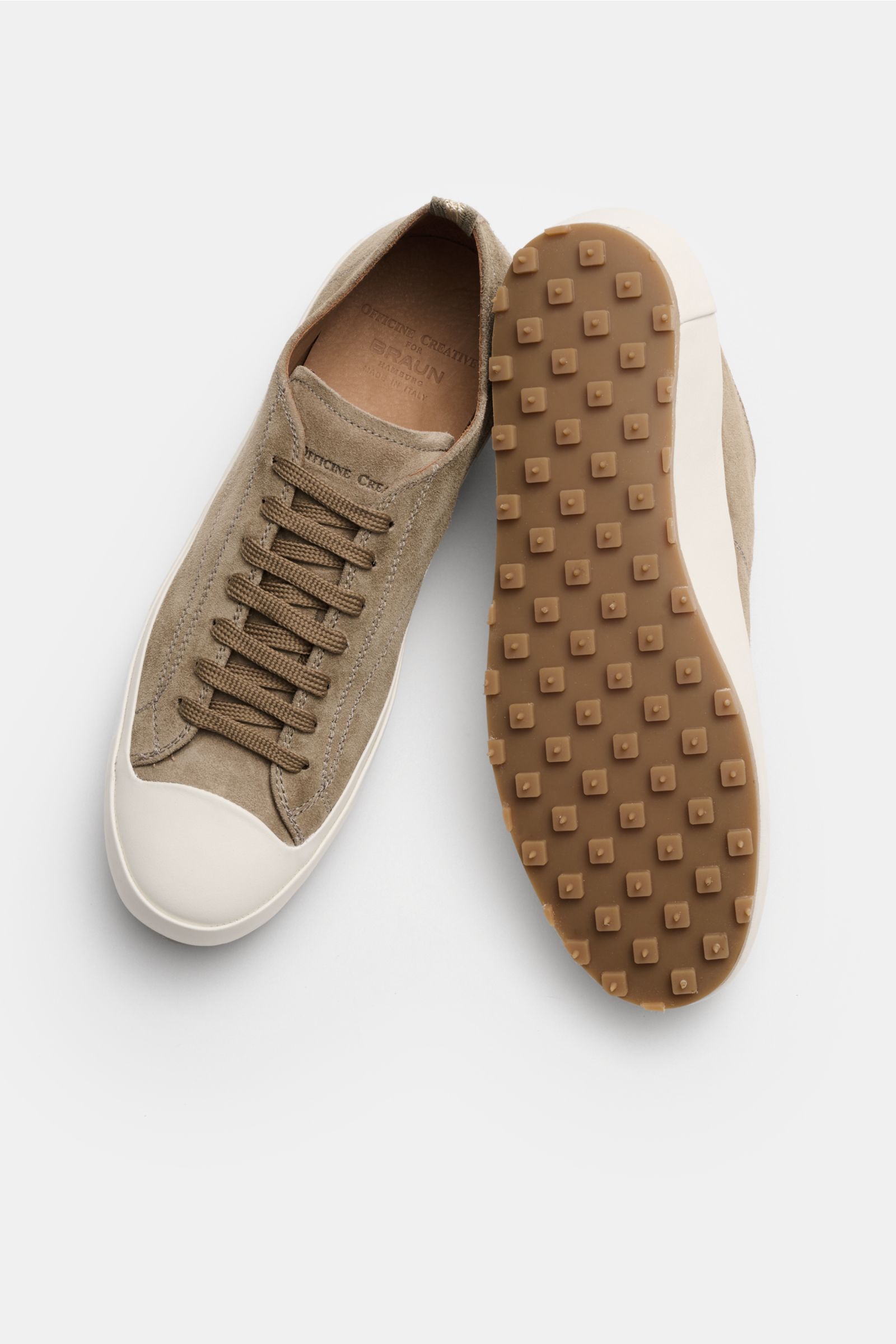 Officine Creative Sneaker 'Vulcan' taupe shown from top and sole view, featuring modern retro design, taupe velour leather, round toe cap, seven-hole lacing, logo-embossed tongue, leather lining, and studded rubber sole.