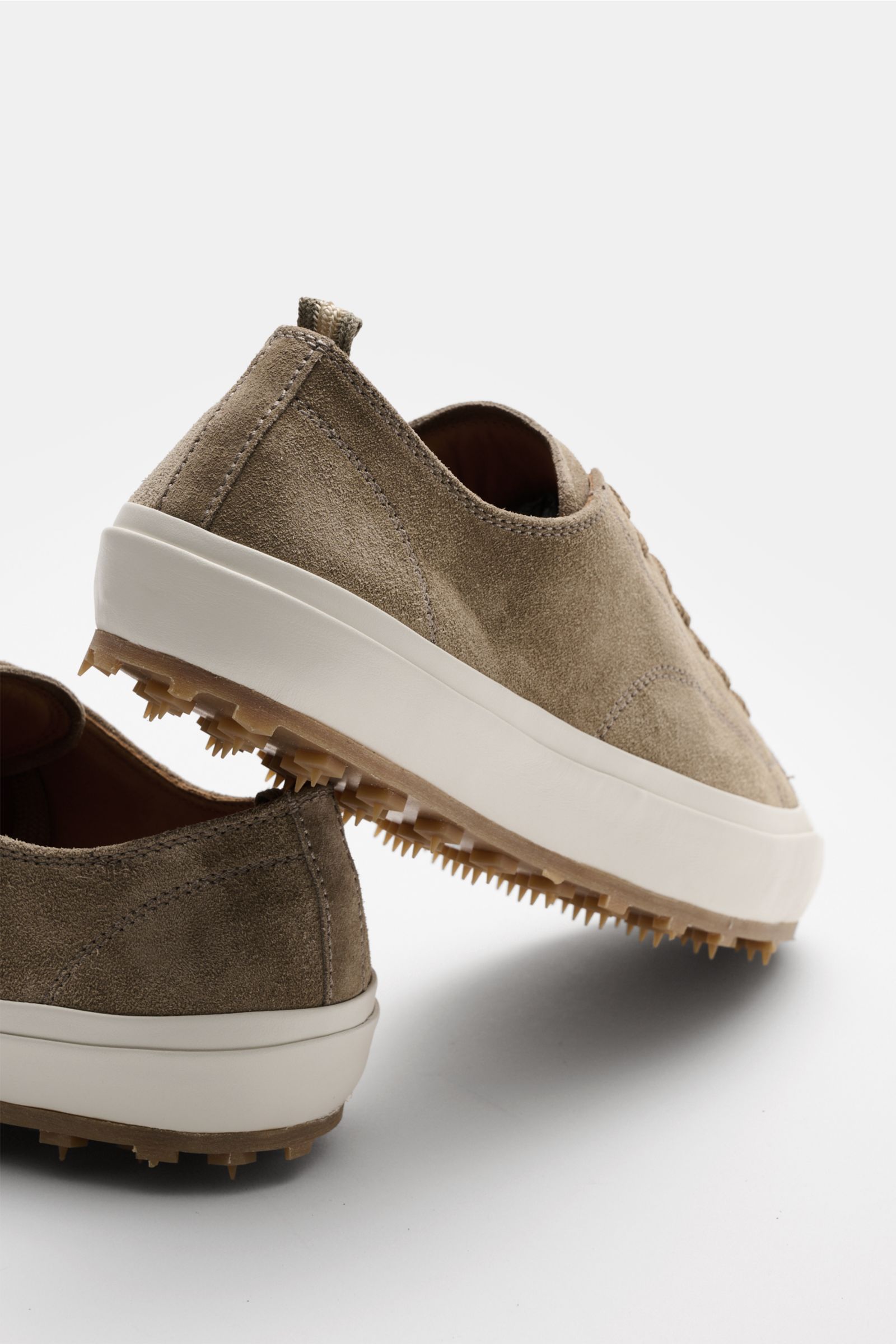 Rear and side view of Officine Creative Sneaker 'Vulcan' taupe in velour leather with round toe, seven-hole lacing, logo tab, leather lining, and studded rubber sole.