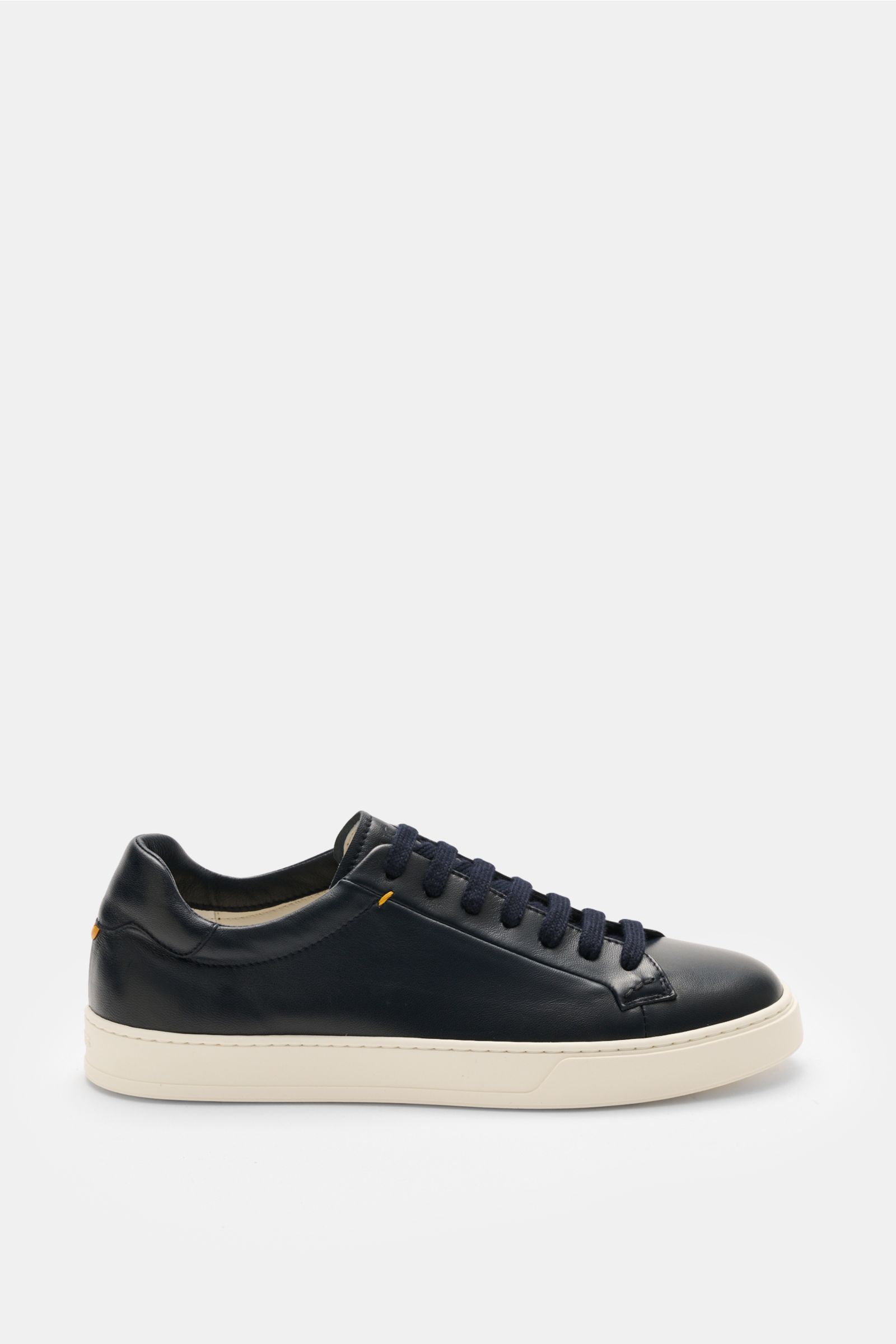 Side view of Doucal's Sneakers 'Plonge' dark navy low top sneaker with premium smooth leather, seven-eyelet lacing, padded topline, leather lining, and flexible rubber sole. Timeless sneakers essential: The low top sneakers 'Plonge' by DOUCAL'S are a vers