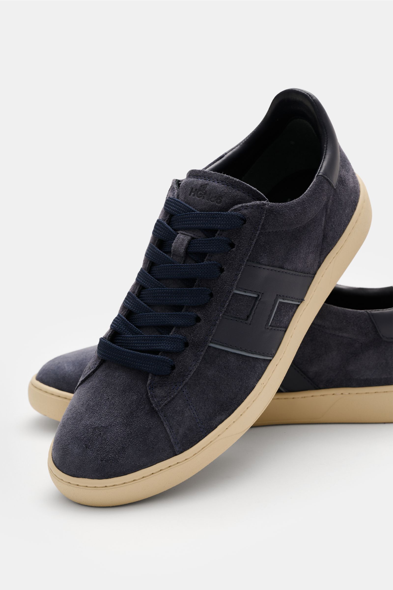 Front-side view of Hogan Sneaker 'Cool Allacciato' navy in smooth suede with navy laces, leather overlays, padded collar, memory foam insole, and beige flexible rubber sole.