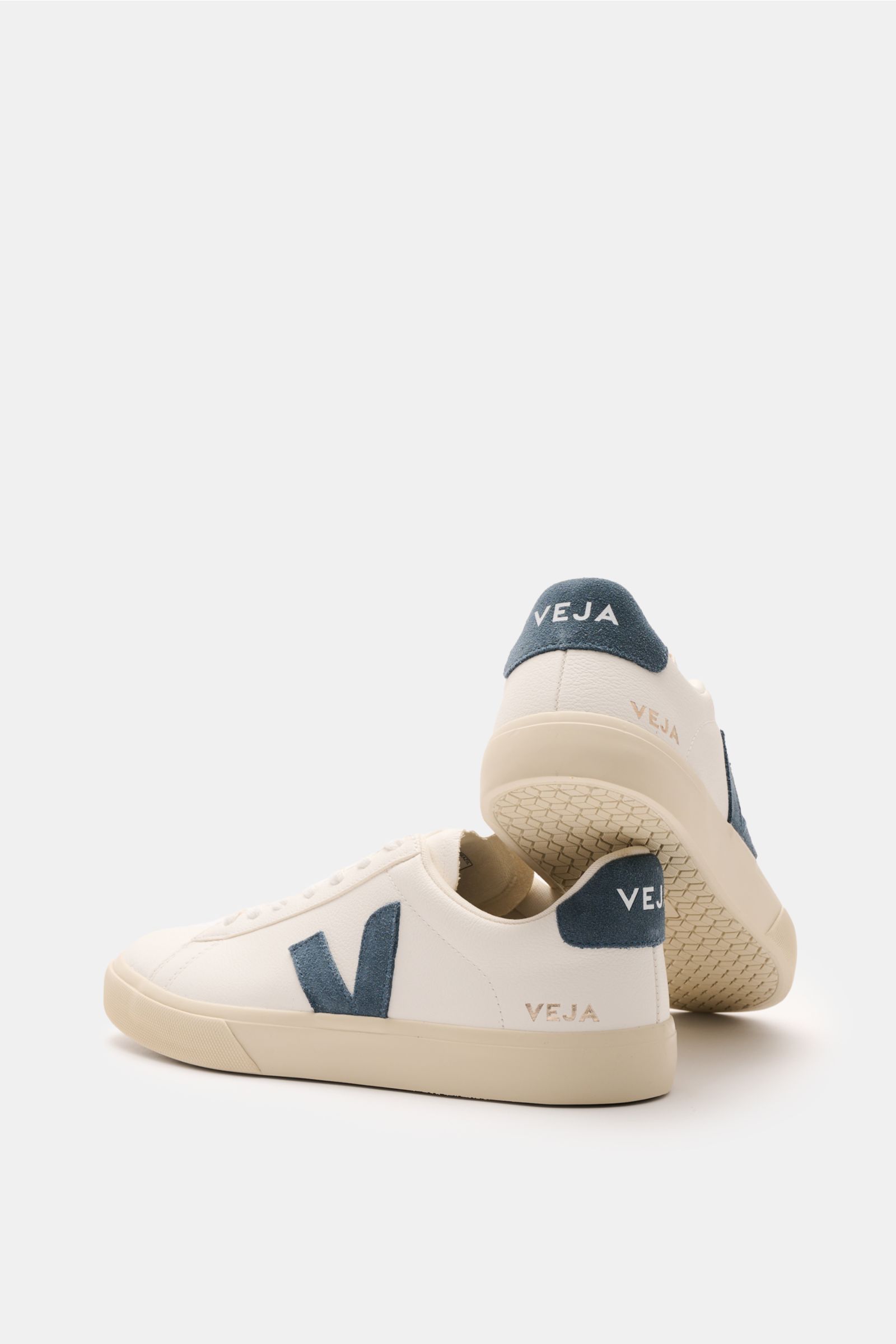 Veja Sneakers 'Campo Leather' off-white/grey-blue shown from a rear-side angle, featuring distinctively grained leather, round toe cap, seven-eyelet lacing, suede overlays, padded topline with logo, VEJA embossing on the back, fabric lining, and flexible 