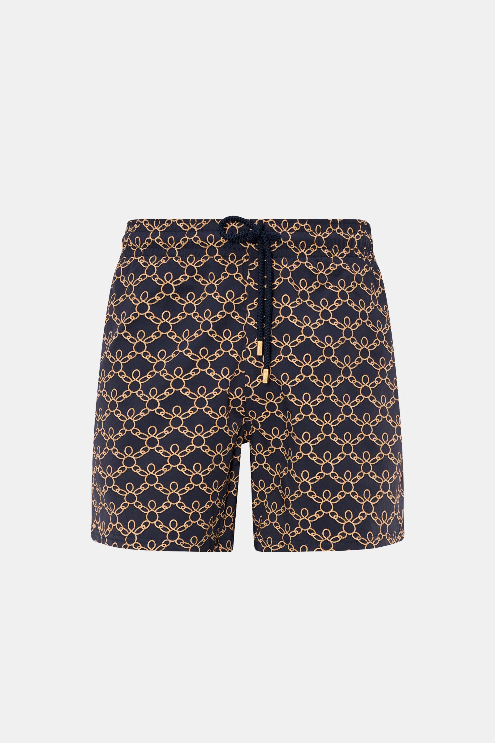 Vorne fotografierte Vilebrequin Badeshorts 'Moorise' dark navy/beige gemustert aus hochwertiger Microfaser mit elastischem Bund und Tunnelzug.
