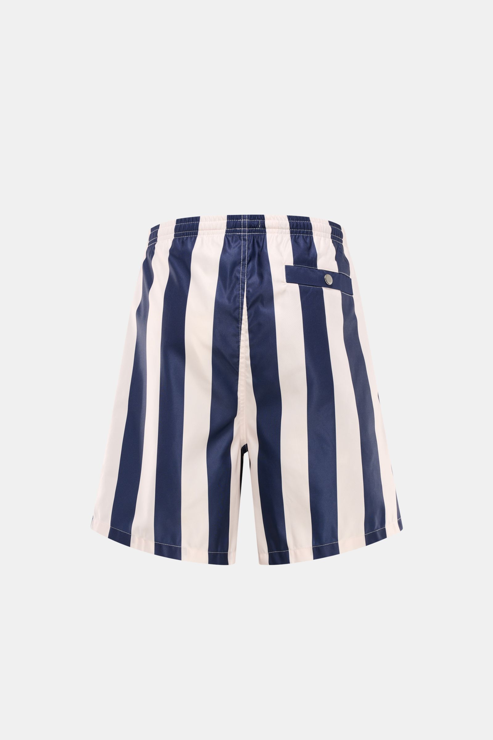 Rear view of Ami Paris Badeshorts navy/weiß gestreift with vertical stripes, elastic waistband, side and back pockets, smooth microfiber.

Description: Lässig durch die warme Saison: Mit den Badeshorts von AMI PARIS überzeugen Sie mit französischem Loo