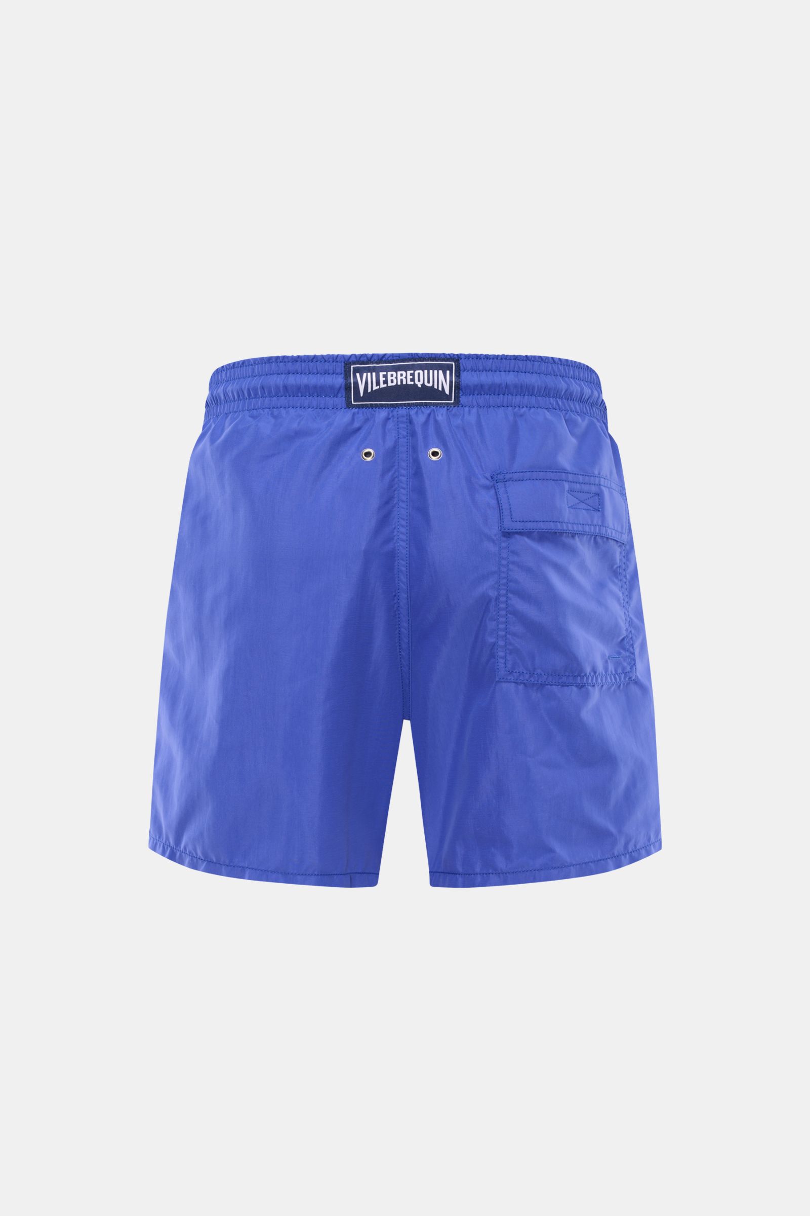Rear view of Vilebrequin Swim shorts 'Moorea' blue with elasticated waistband, side pockets, back pocket with fastener, and drainage eyelets. Summer, sun, freedom: The 'Moorea' swim shorts by VILEBREQUIN are the perfect stylish companion for long days at 