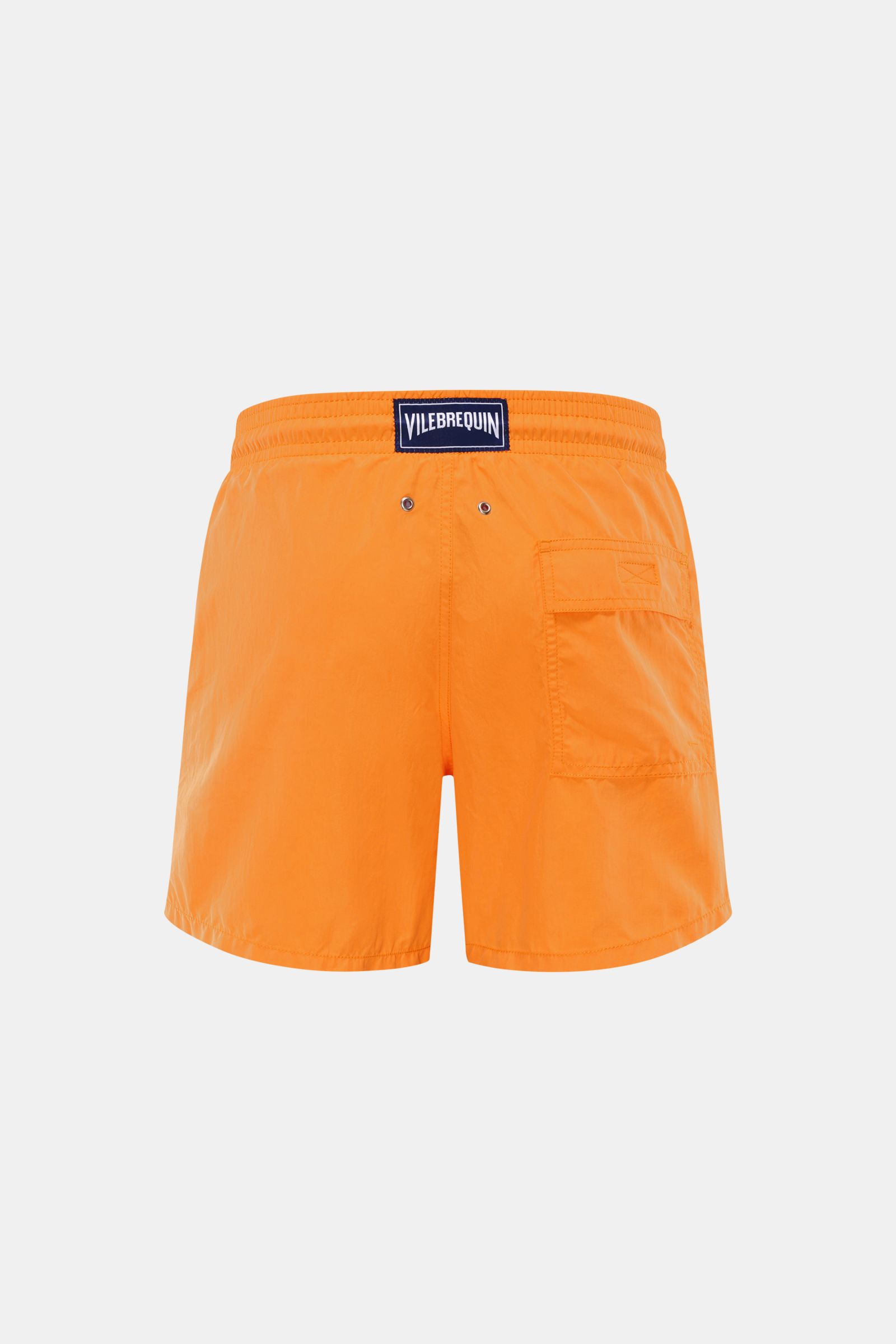 Rear view of Vilebrequin Swim shorts 'Moorea Magic' orange in high-quality microfibre with elasticated waistband, side and back pockets, tonal stitching, and VILEBREQUIN label, changing color in water, photographed against a white background.