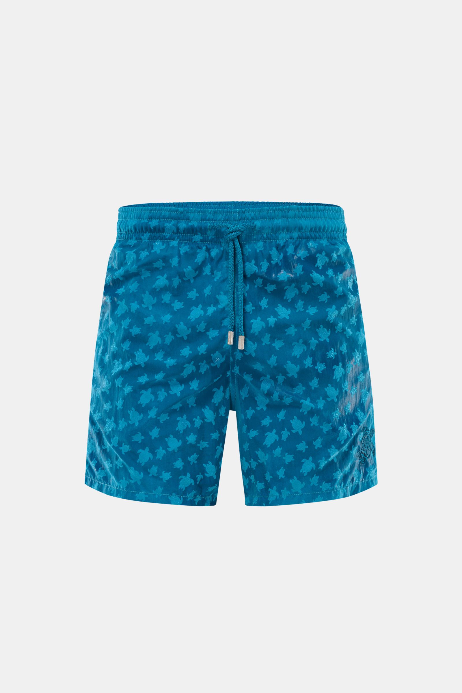 Vorderansicht der Vilebrequin Badeshorts 'Moorea Magic' petrol aus hochwertiger, wasserreaktiver Microfaser mit elastischem Bund, Tunnelzug, Taschen und Mesh-Futter.