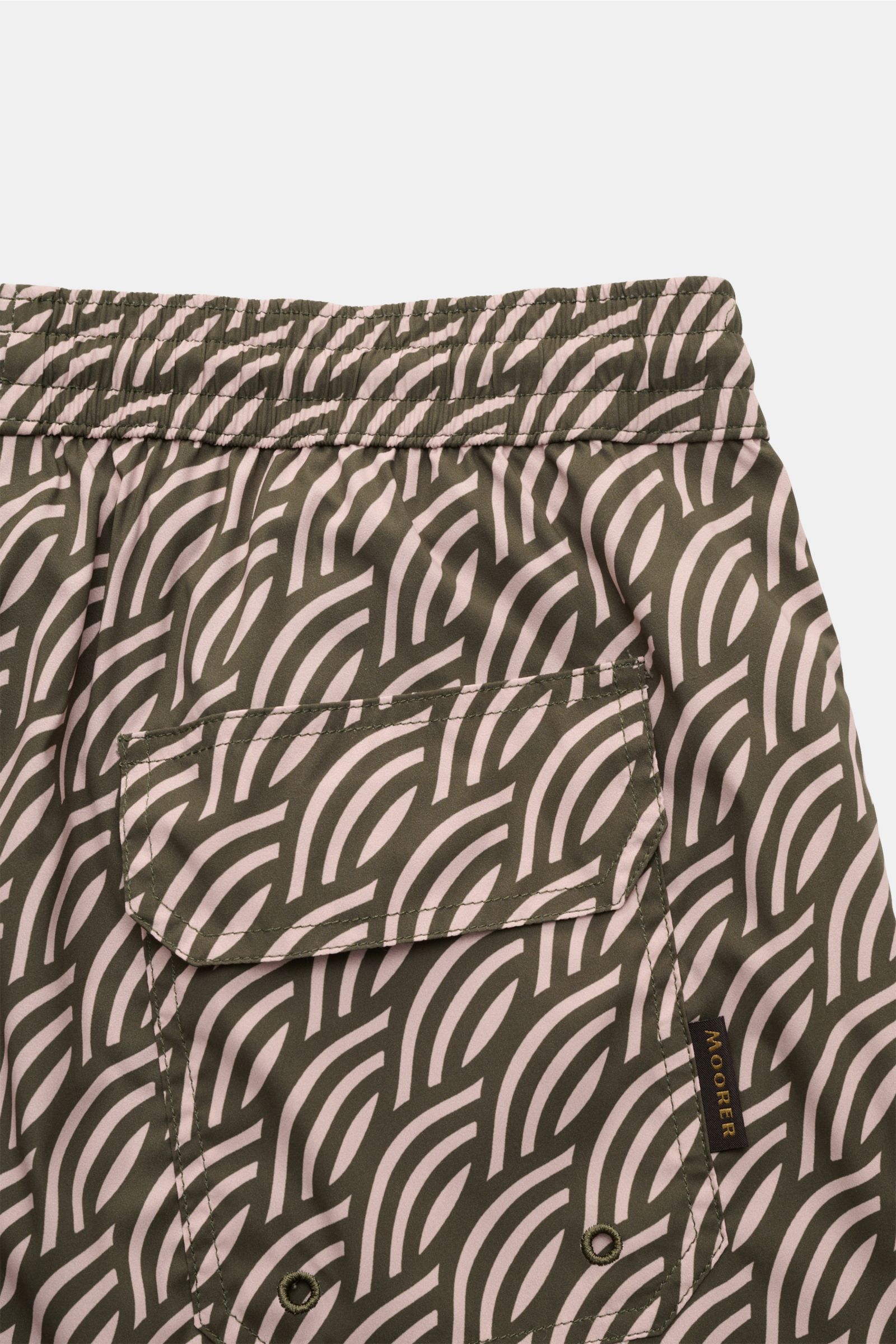 Moorer Swim shorts dark green/antique pink patterned shown from the back, featuring elasticated waistband with drawstring, quick-drying microfibre, smooth feel, regular fit, small key pocket inside, side seam pockets, back pocket with flap, and smooth lin