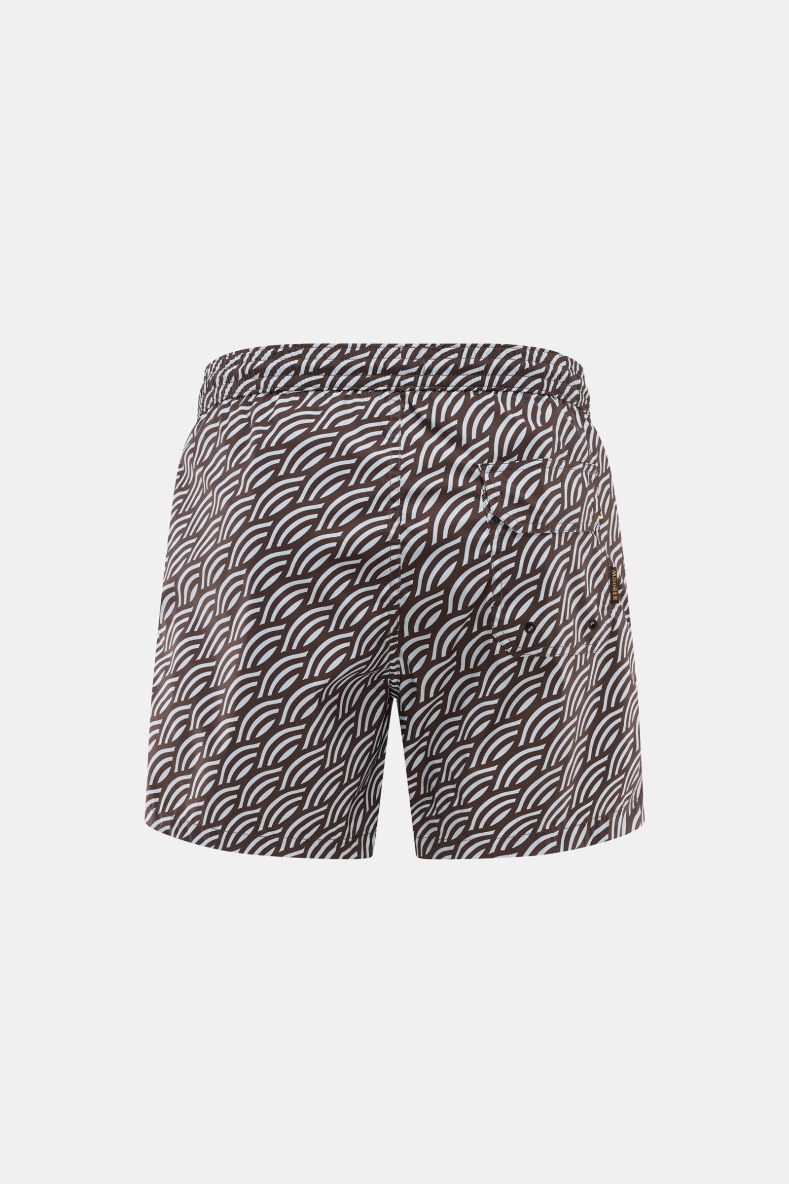 Moorer Swim shorts dark brown/smoky blue patterned shown from the back, featuring quick-drying microfibre, smooth feel, regular fit, elasticated waistband with drawstring, small key pocket inside, pockets in the side seam, back pocket with flap, and smoot