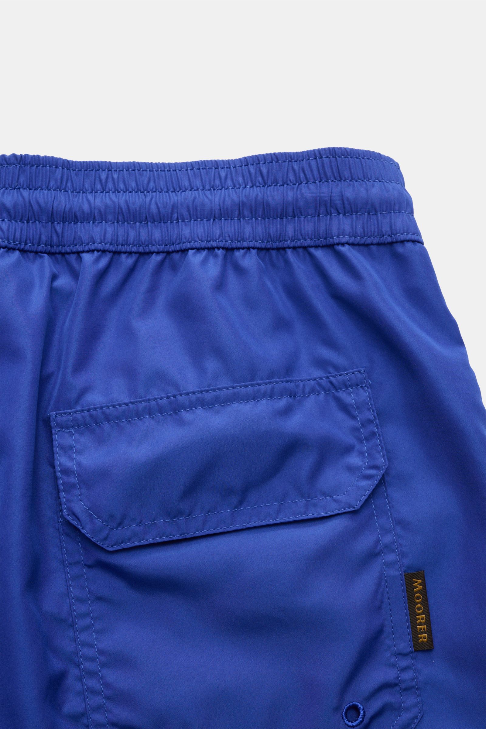 Close-up rear view of Moorer Swim shorts 'Portofino' dark blue showing elasticated waistband, back pocket with flap, quick-drying microfibre, smooth feel, regular fit, elasticated waistband with drawstring, small key pocket inside, pockets in side seam, b