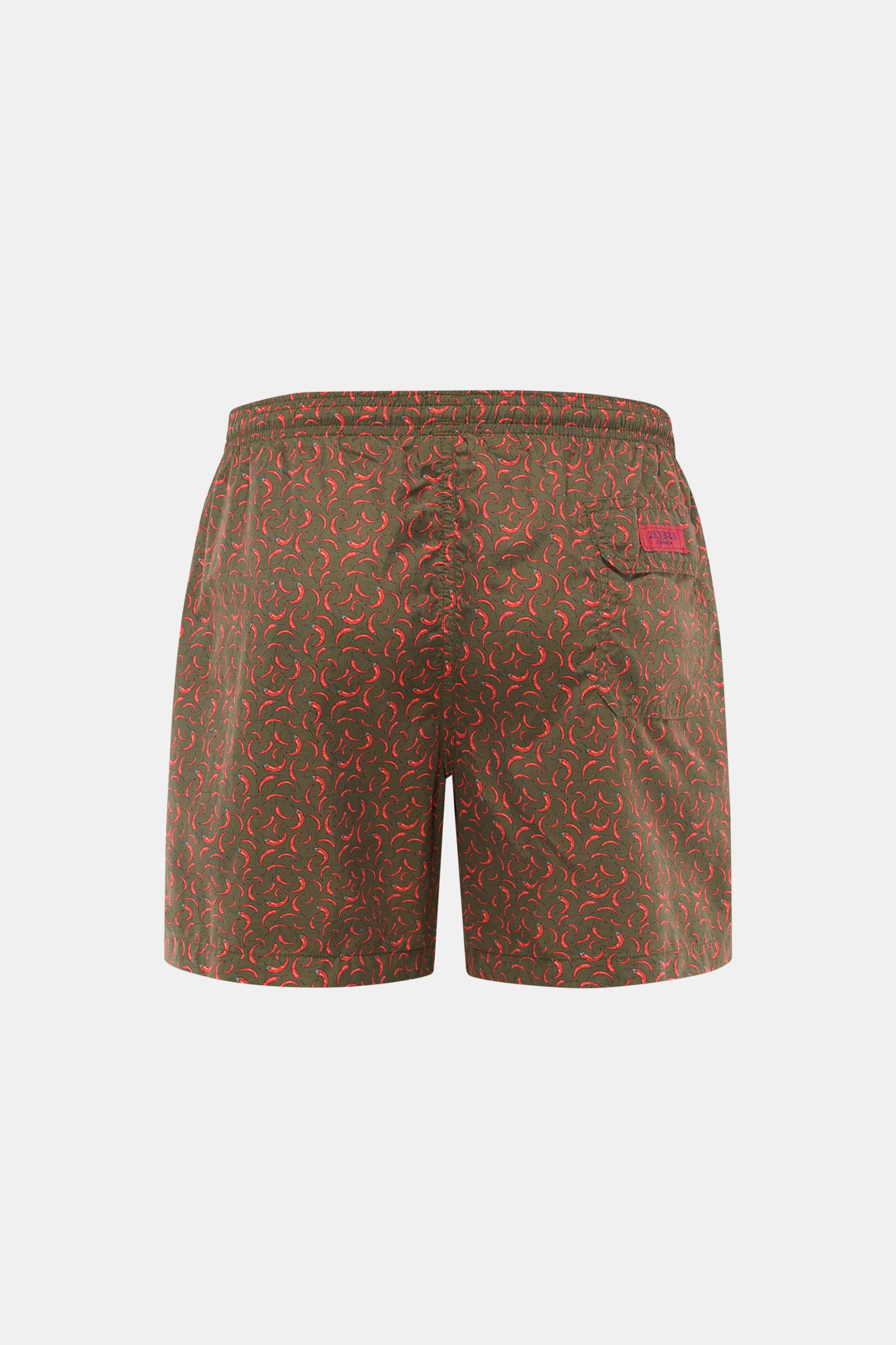 Rear view of Zeybra Portofino 1962 Badeshorts 'Peperoncini' dunkelgrün/rot gemustert with elastic waistband, side seam pockets, and Velcro back pocket, showcasing short cut and vibrant chili pepper print on high-quality microfiber fabric.

Eyecatcher f