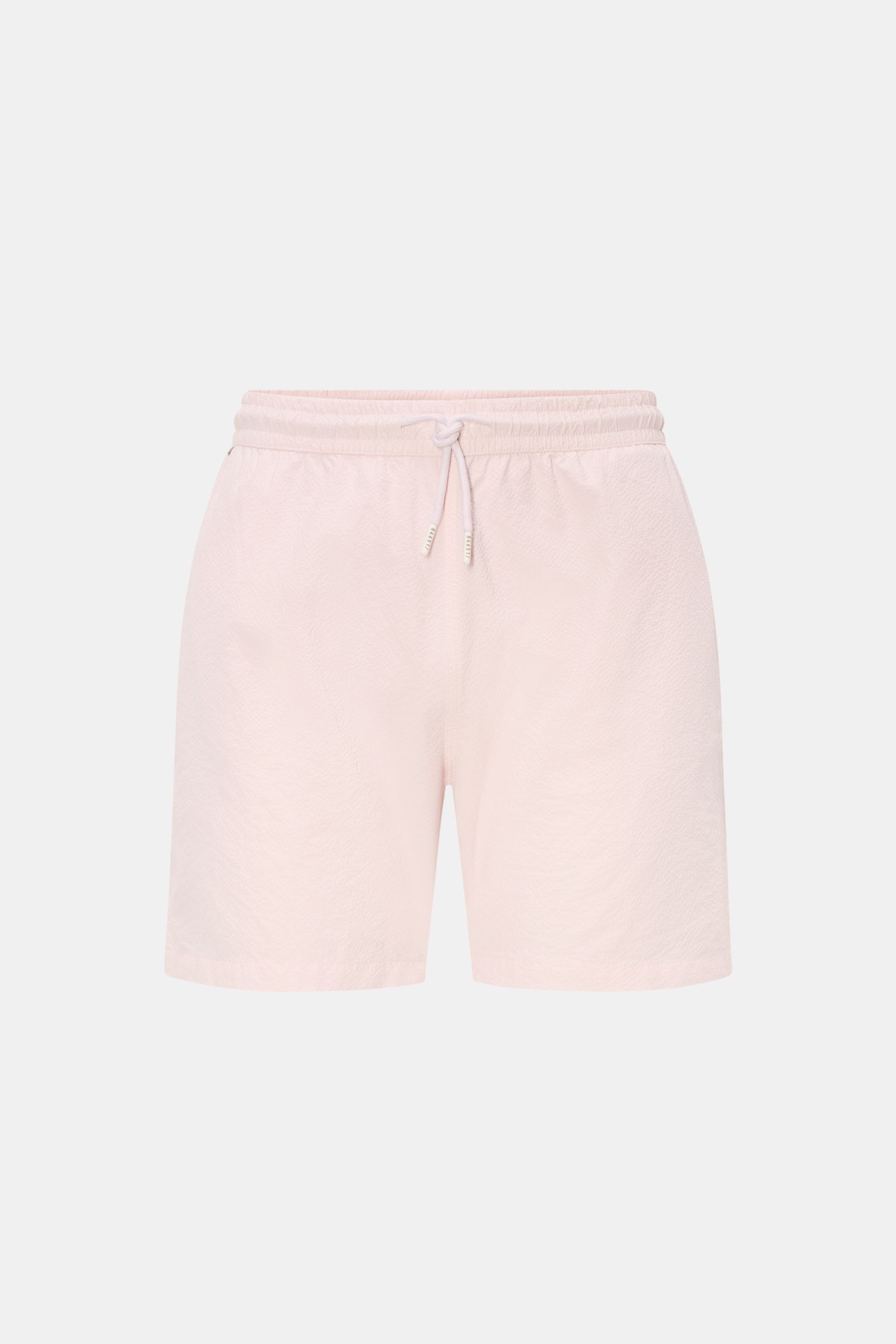 Front view of 04651/ A trip in a bag Swim shorts 'Mono Seersucker' rose in light pink seersucker fabric, elastic waistband with drawstring. Perfect for your next summer holiday: With their design in seersucker look, these swim shorts by 04651/ A TRIP IN A