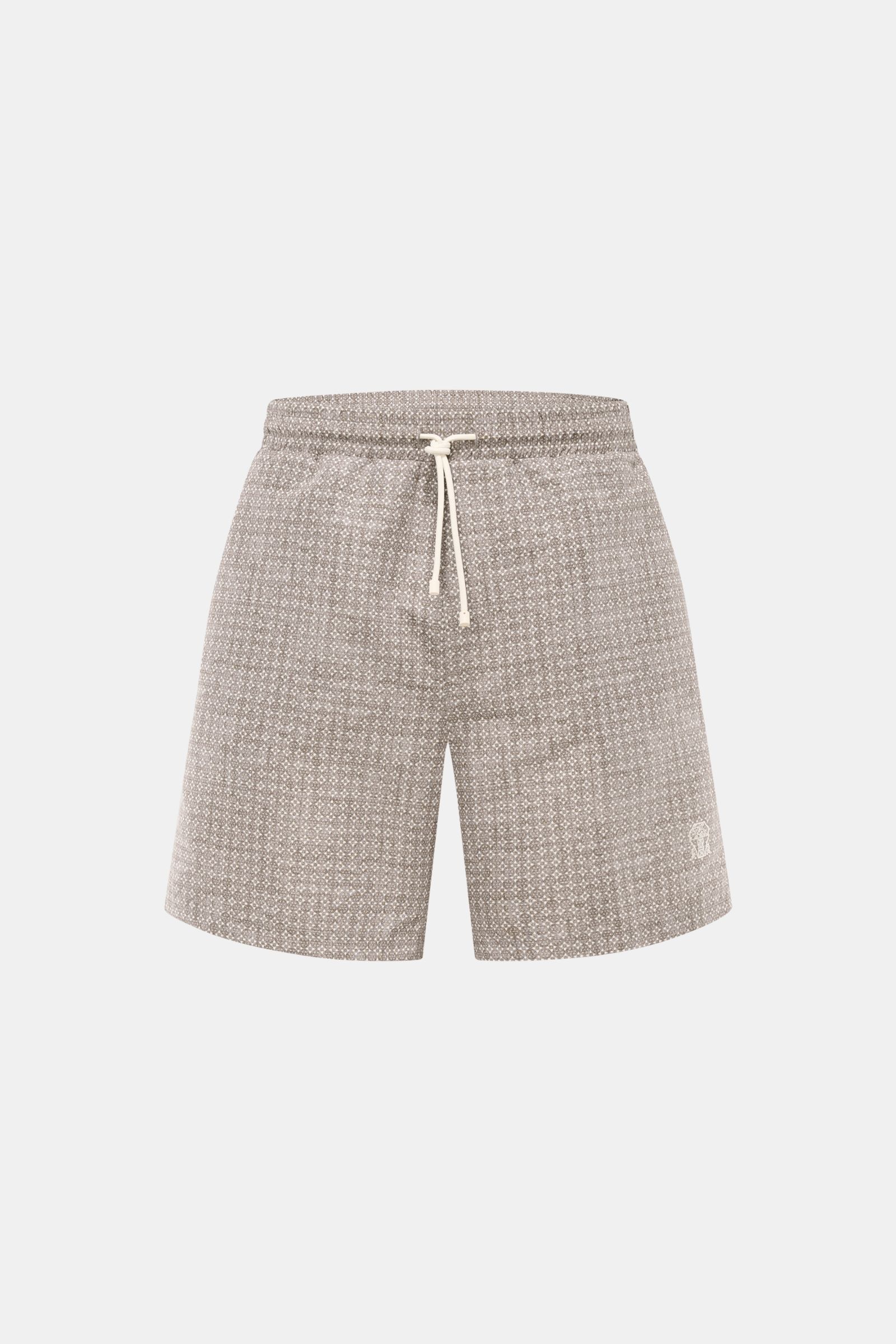 Front view of Brunello Cucinelli Badeshorts oliv/creme gemustert with floral pattern, elastic waistband, drawstring, and logo stitching. Luxuriös entspannen: Mit ihrem floralen Muster sowie dezenten Logo-Stitching werden die Badeshorts von BRUNELLO CUCINE