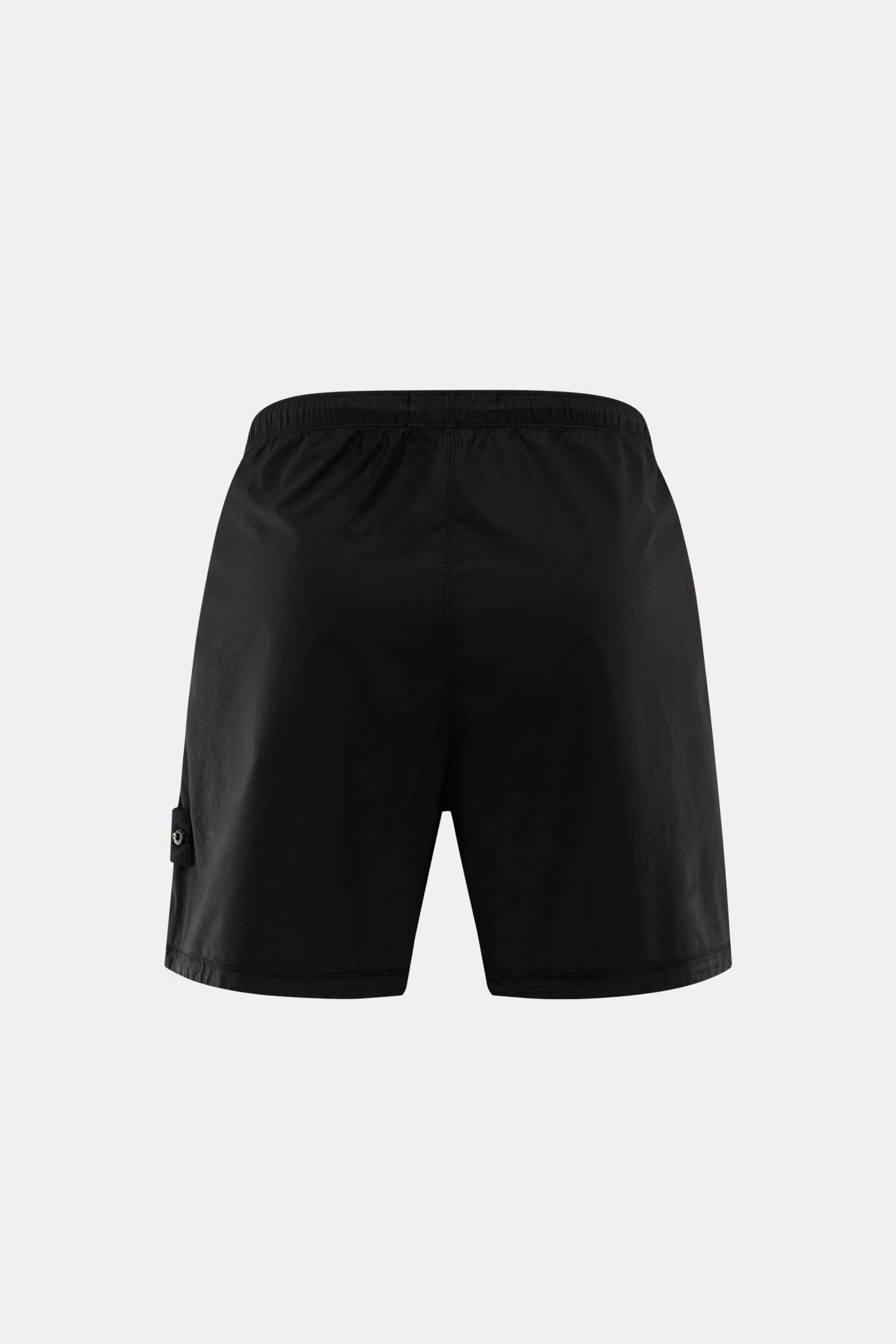 Stone Island Shorts 'Paracadute' black shown from the back, made of pure cotton with elastic waistband, compass badge, and overlock seams.
