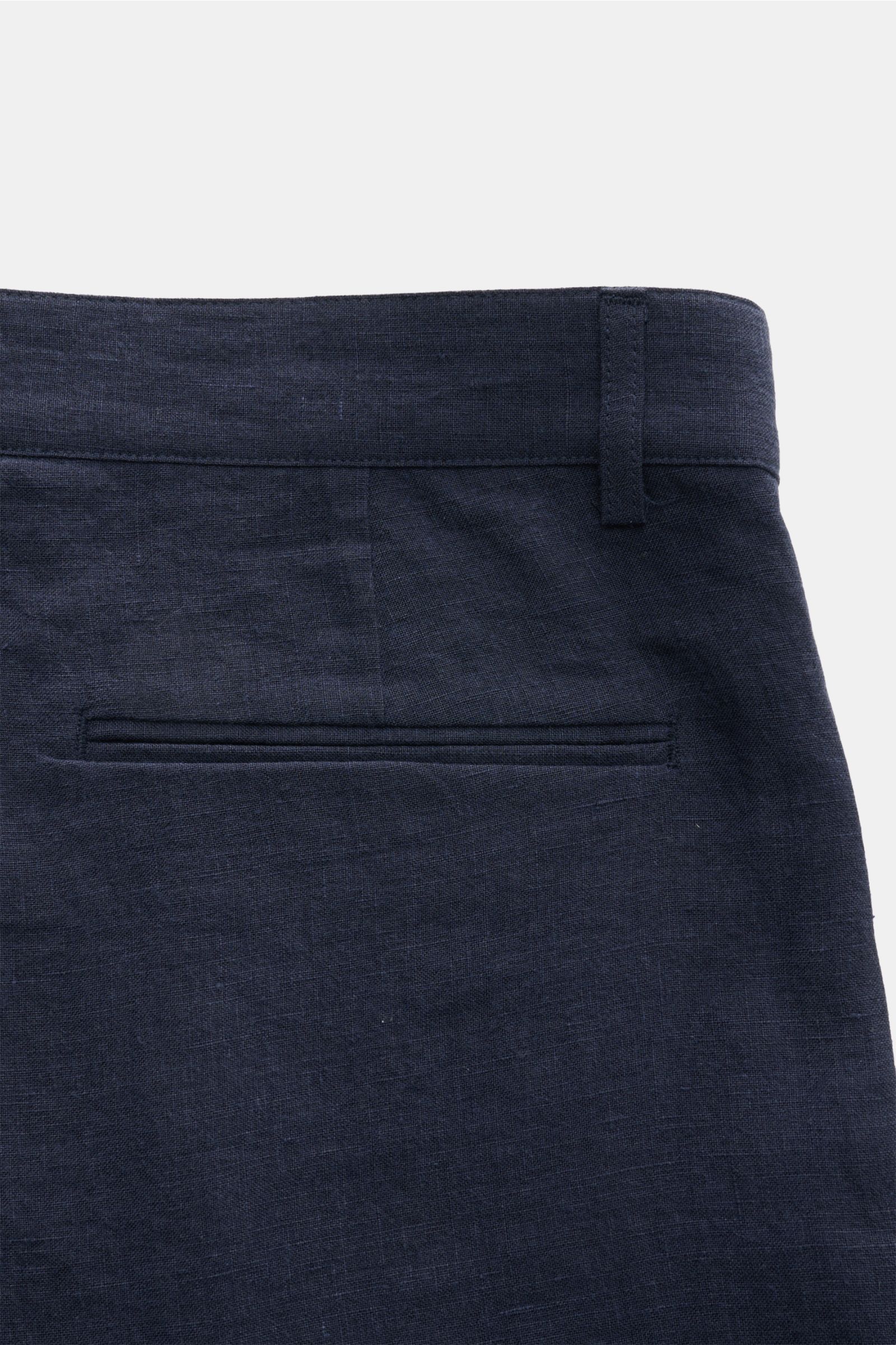 Close-up rear view of Percival Linen shorts navy showing jetted back pockets, belt loop, and linen texture in deep navy color.

Stay smart this summer: These shorts made of pure, airy linen by London label PERCIVAL is made for looks with elegant ease.