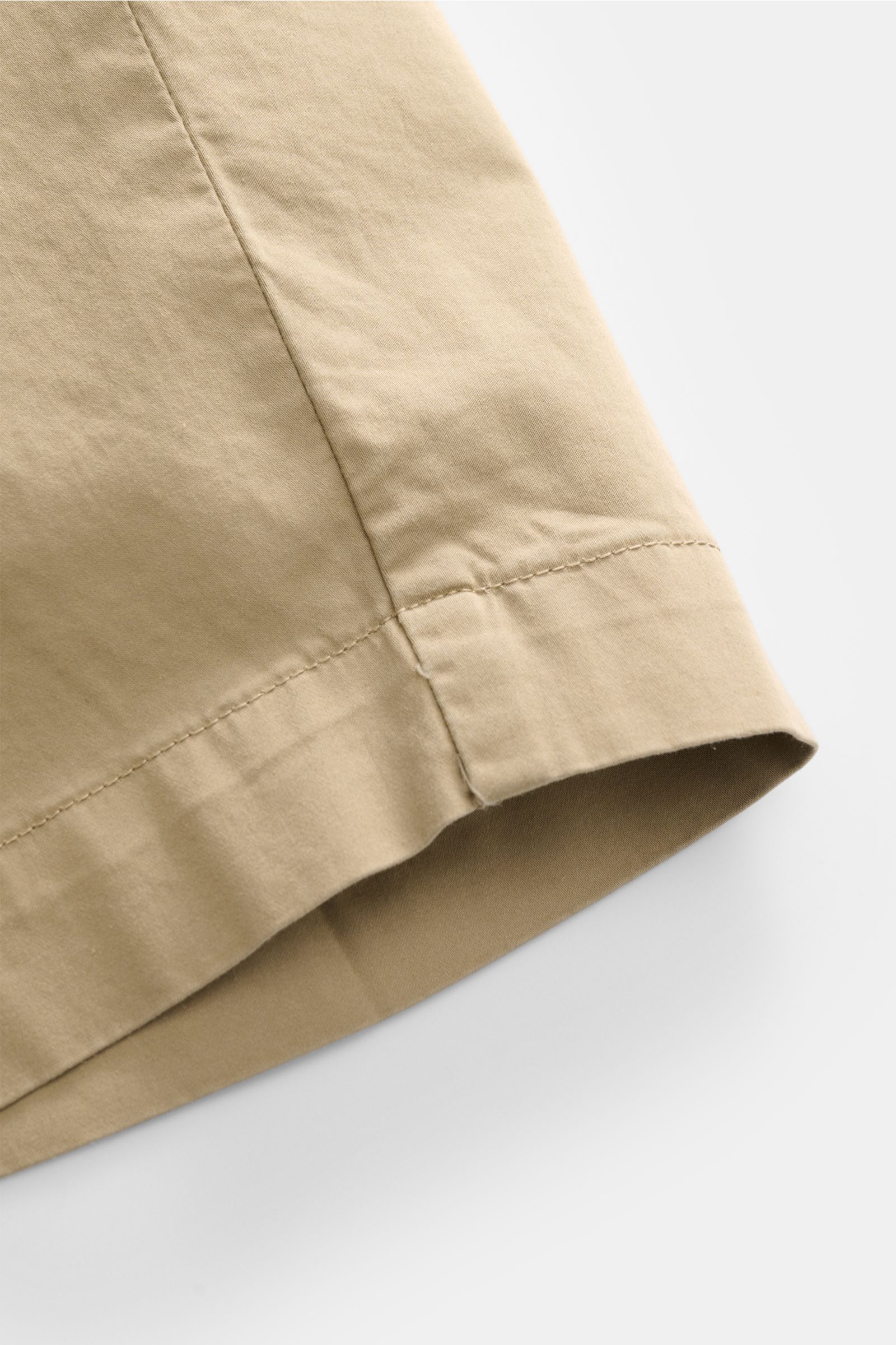 Close-up side view of PT Torino Bermudas sand shorts in soft beige cotton, highlighting fabric texture and stitching details.

Typically stylish: These shorts in soft cotton by PT TORINO are the best choice for elegant summer looks.

Smooth