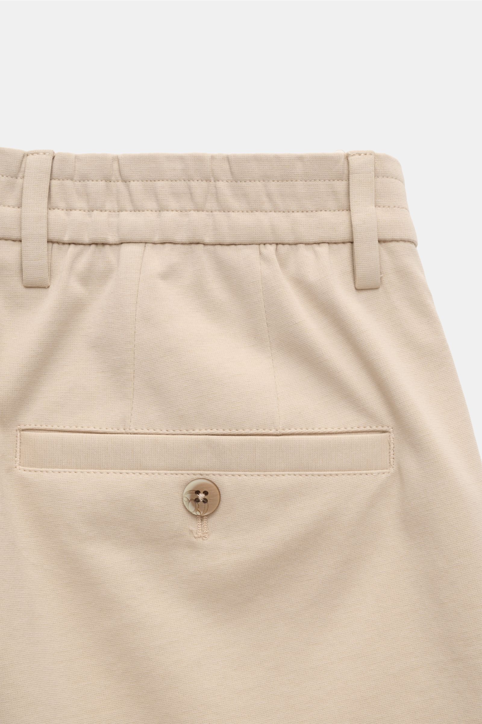 Close-up rear view of GTA Jersey shorts 'Davide' beige showing waistband, belt loops, back pocket with button.

A soft blend of cotton and premium microfibre in a jersey finish makes the casual shorts 'Davide' by GTA a comfortable model for your next s